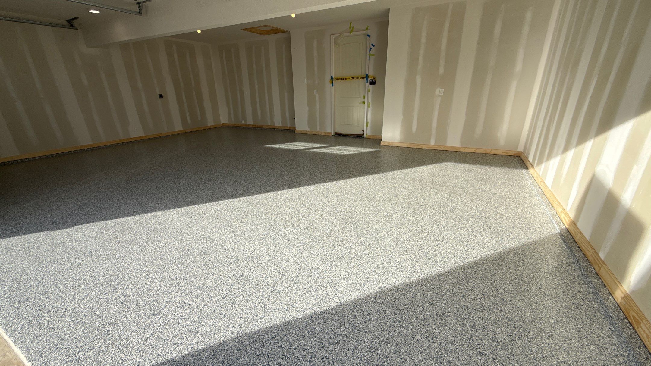 New floor for Dusty Rhodes homes in Raymore! by Banner Garage