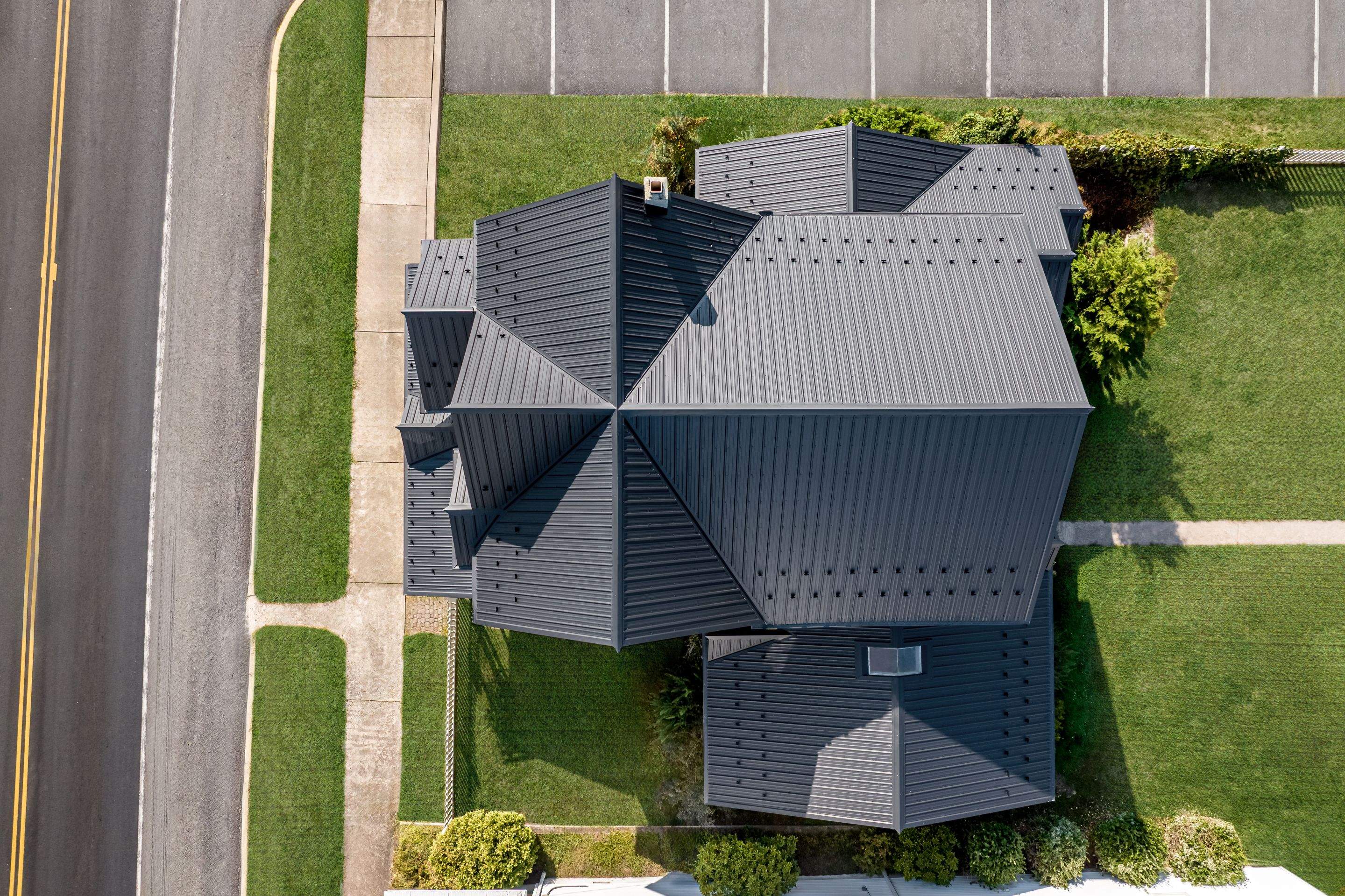 Textured Black Meal Roof by Esh Builders