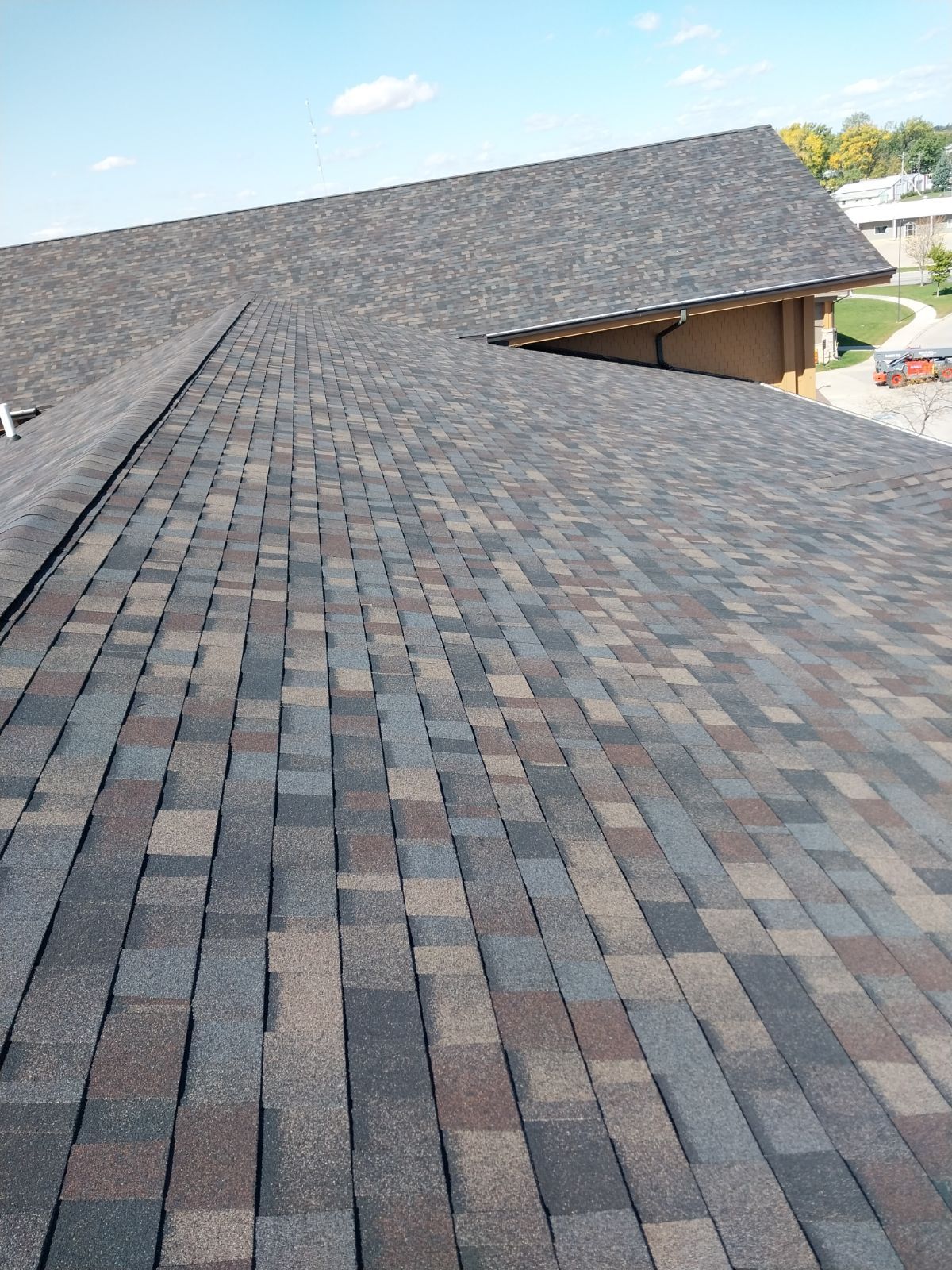 Commercial Roofing Installation using Shingles by Grell Roofing, LLC