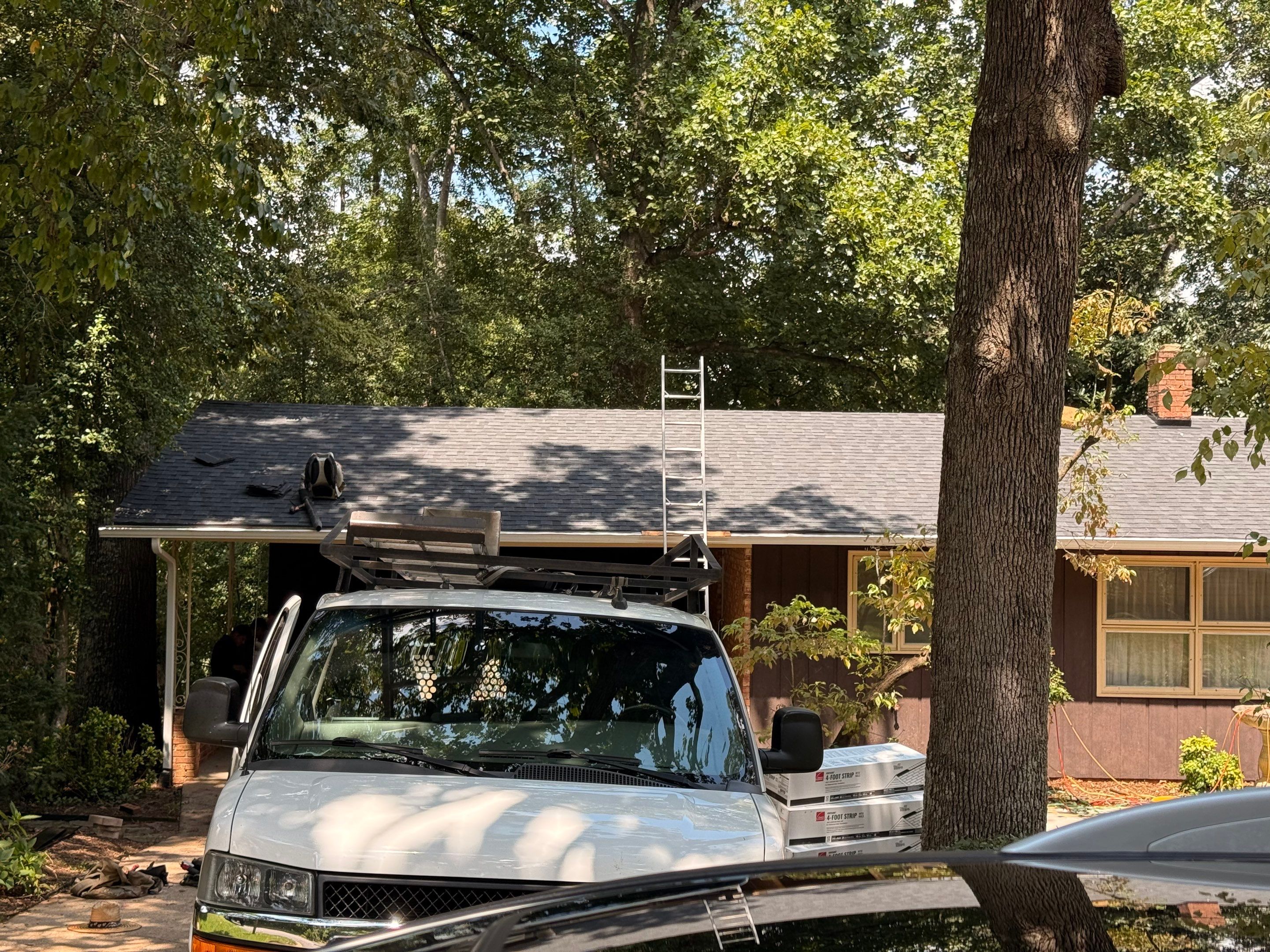 Residential Roof Replacement using TAMKO Titan XT Rustic Black by RISE Roofing & Restoration, LLC