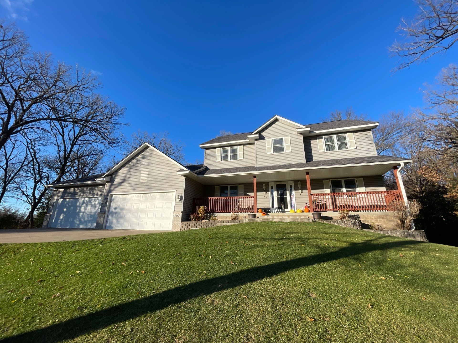 Roof & Siding Replacement – Oak Grove, MN | Insurance-Approved | Owens Corning Duration Midnight Plum & Mastic Carvedwood Harbor Grey by First Impressions Exteriors