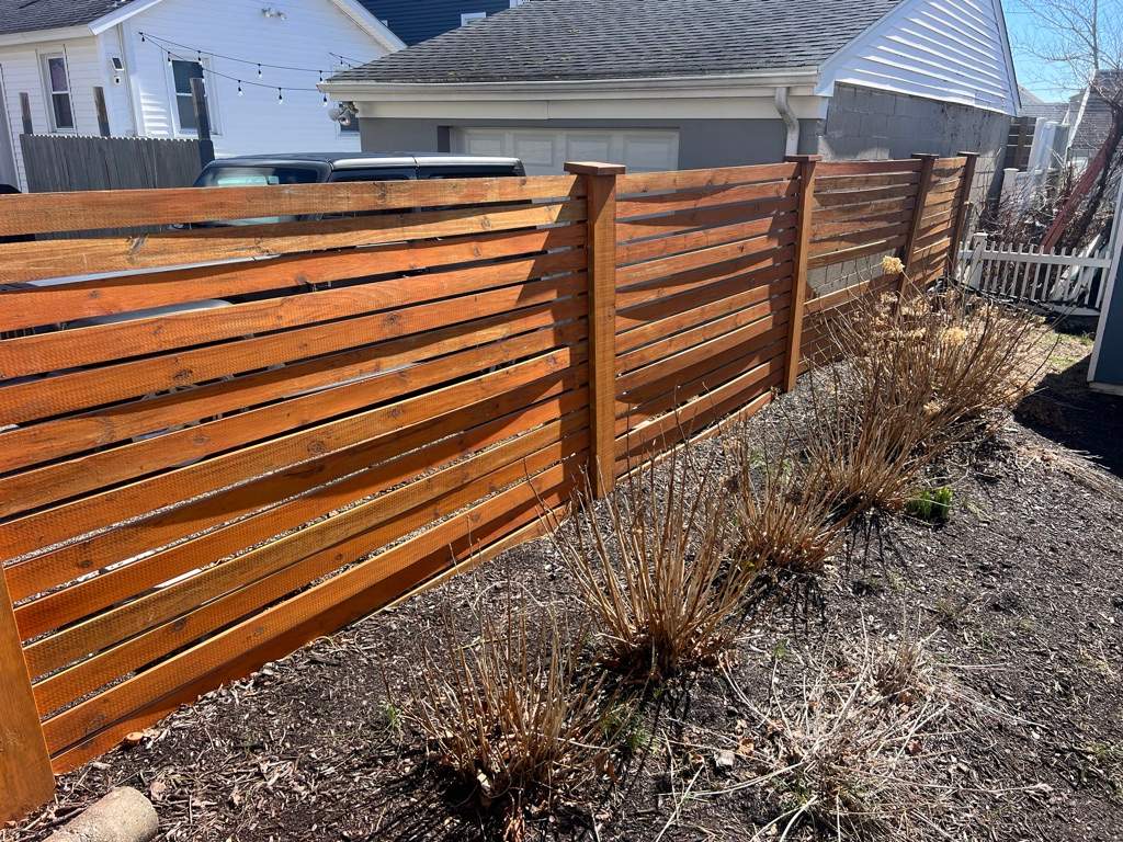 Fence install, White vinyl privacy fence with lattice accent. by DiGiorgi Roofing and Siding Inc