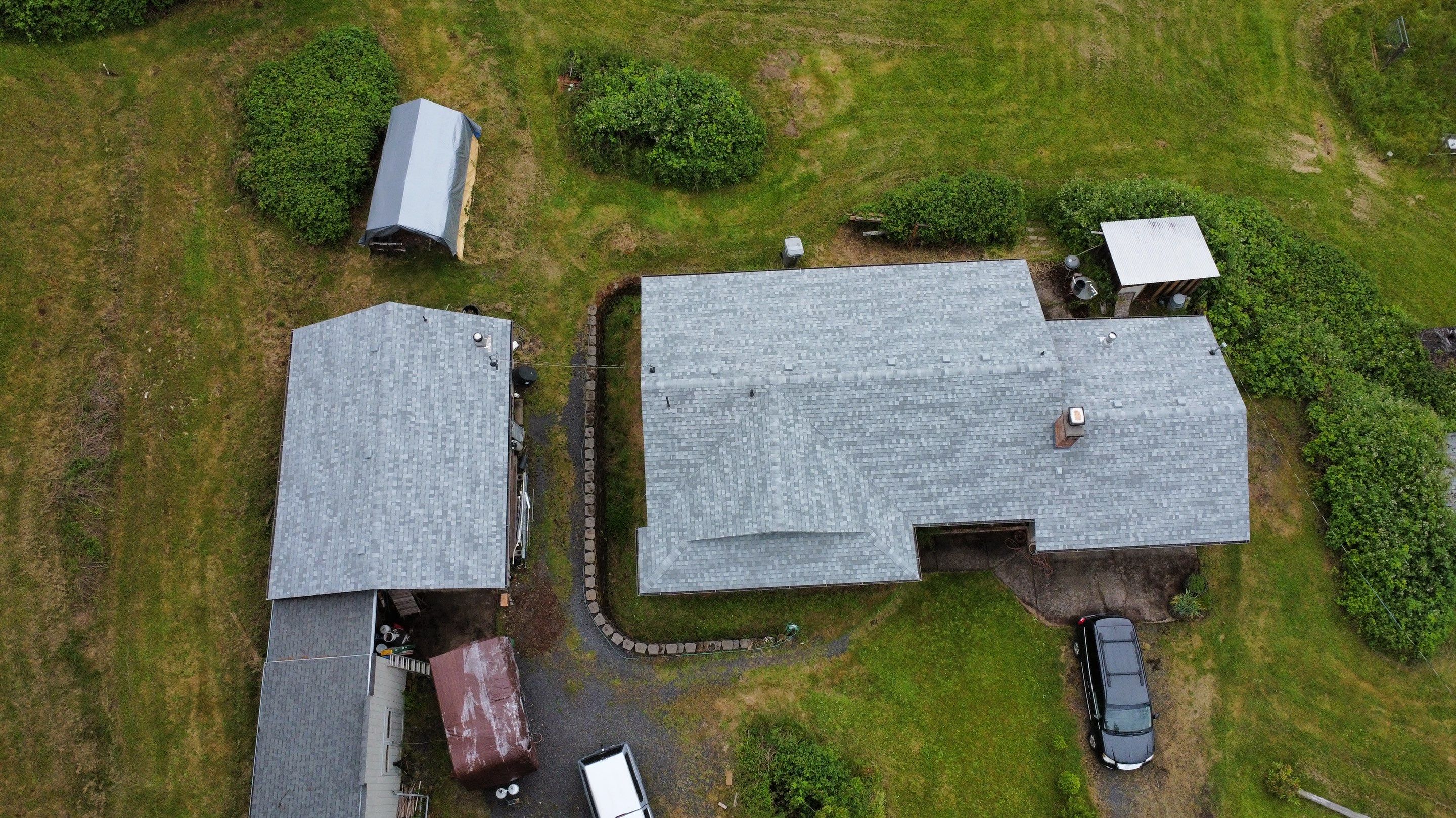 Residential Roofing Installation using IKO Dynasty (Color: Frostone Grey) by Orezona Building & Roofing Company, Inc.