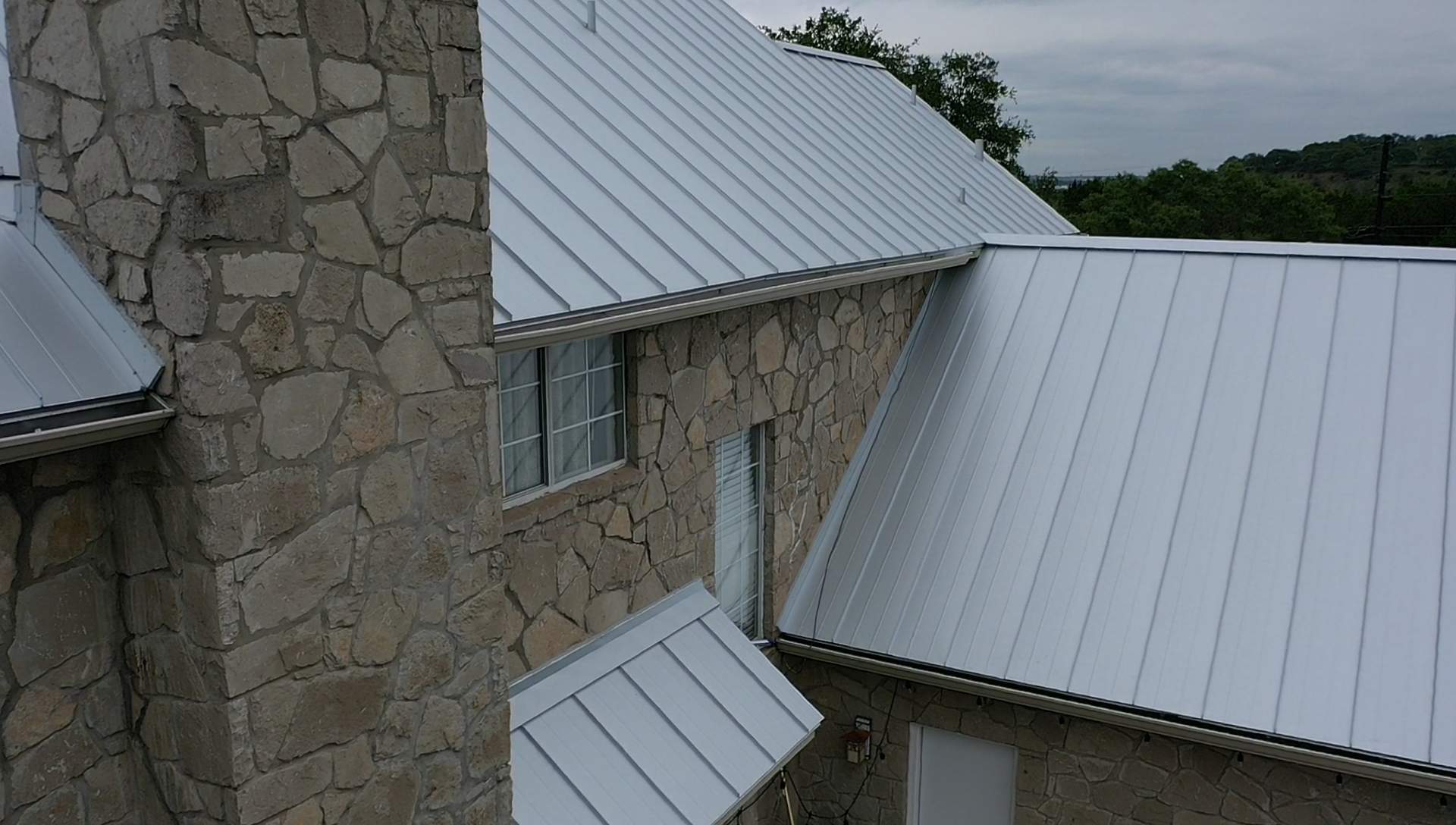 Residential Metal Roof Installation using McElroy Metal by Premier Roofing and Contracting