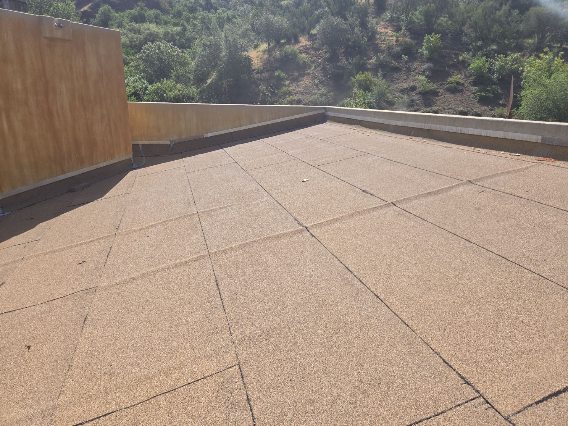 Tan Silicone Applied to a Stunning Residential Property in Calabasas by Hull Brothers Roofing