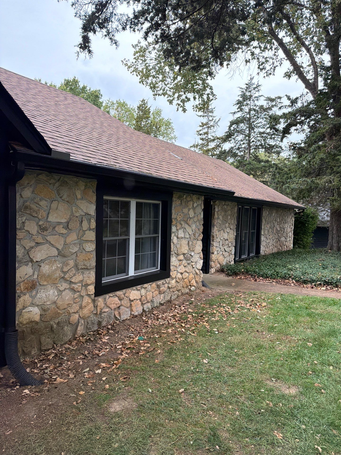 Wood siding refresh by Pezley Painting