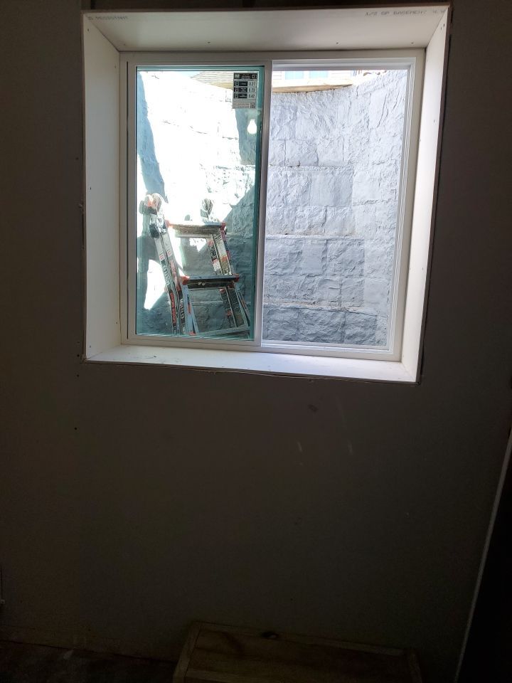 Egress Window Installation using Rockwell Egress Fiberglass Egress Window Well by Toledo Basement Repair 