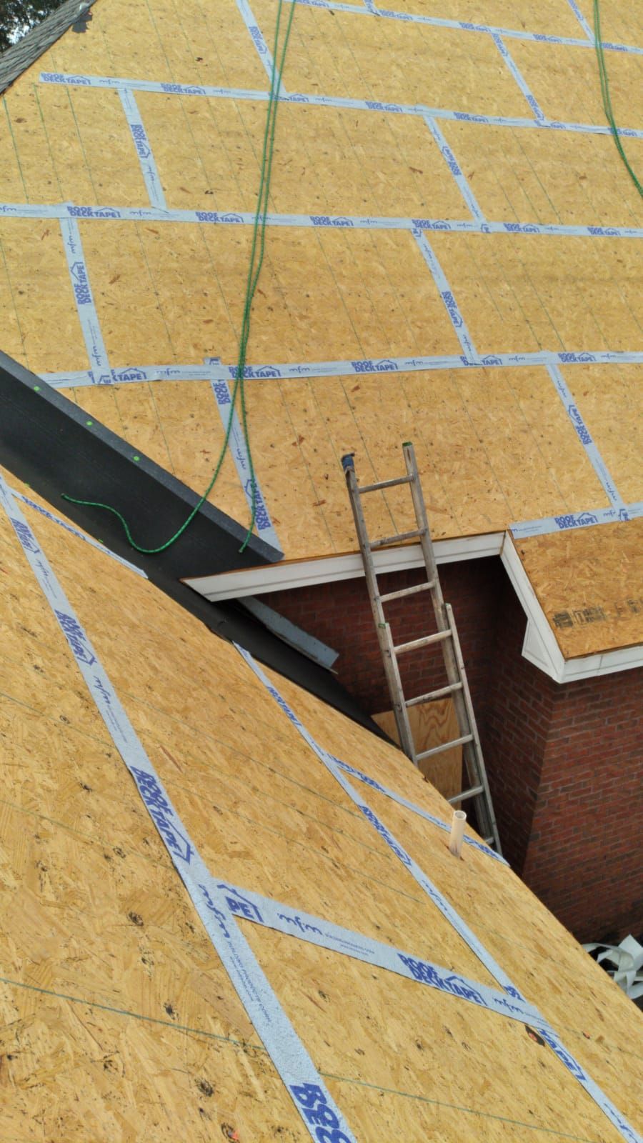 Residential Roofing Installation using Roof Replacement by American Roofing & Construction LLC