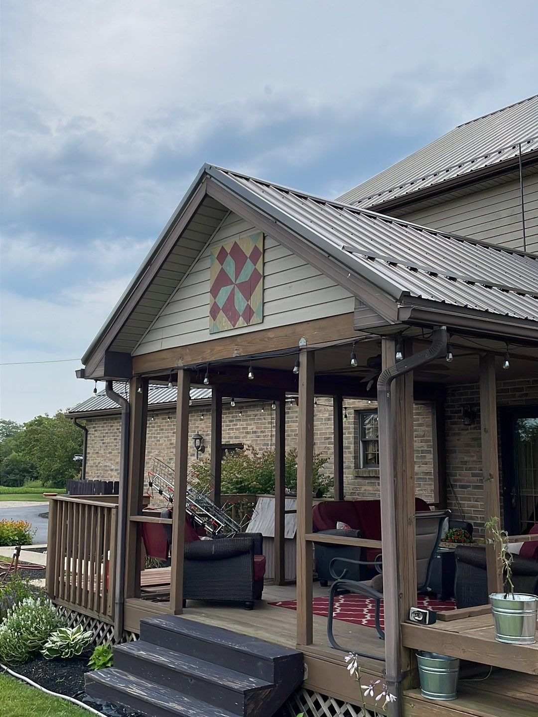 Residential Roofing Installation using Performance Panel Metal - Burnished Slate by RoofX 