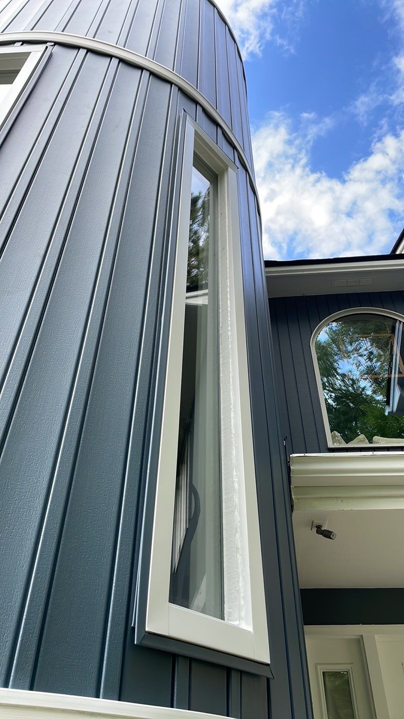 Siding Replacement using CertainTeed Board & Batten Pacific Blue by 180 Contractors