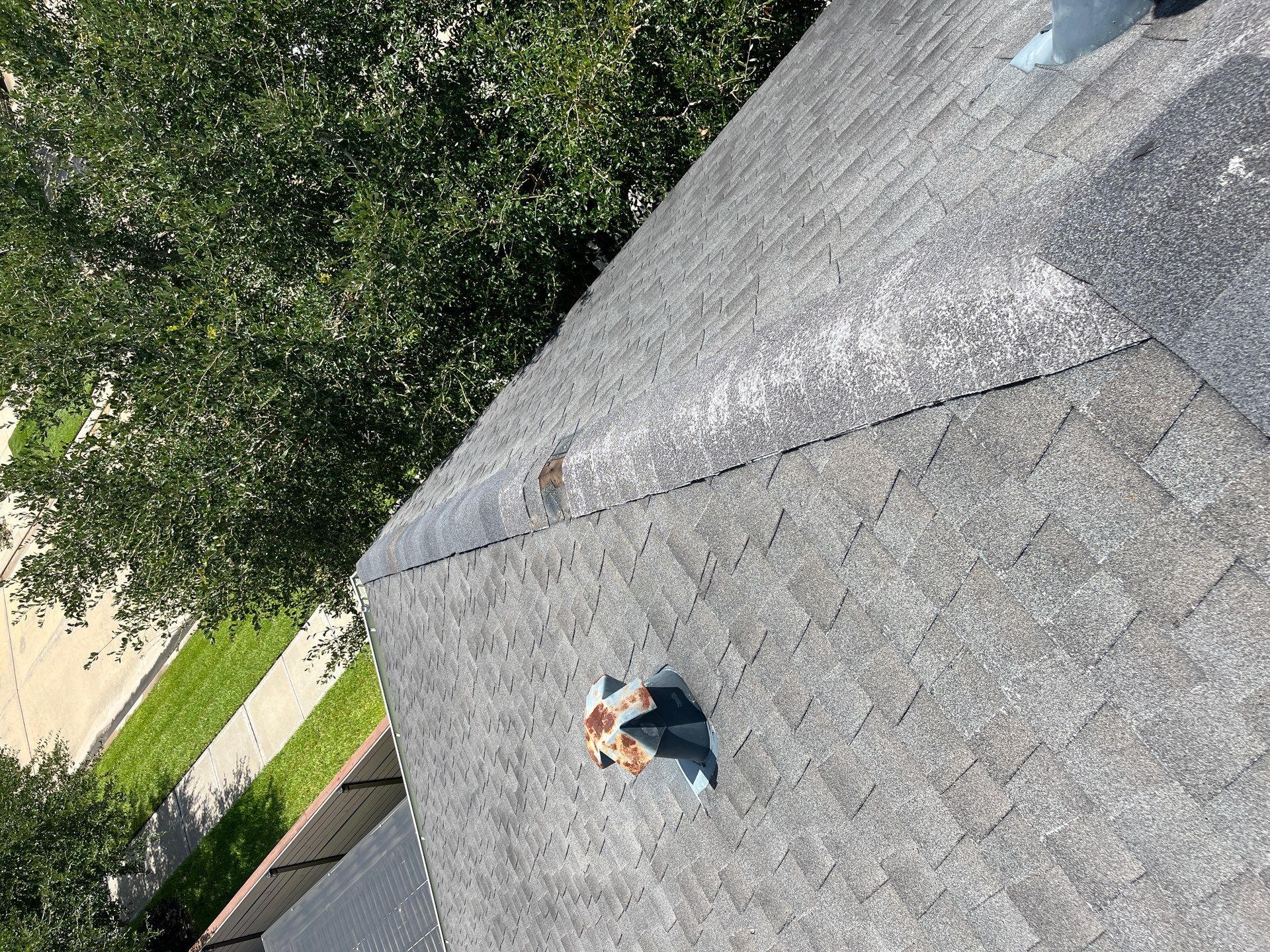 Hail Damage using Owen's Corning Duration (Lifetime) Shingles by Roof Repair Company