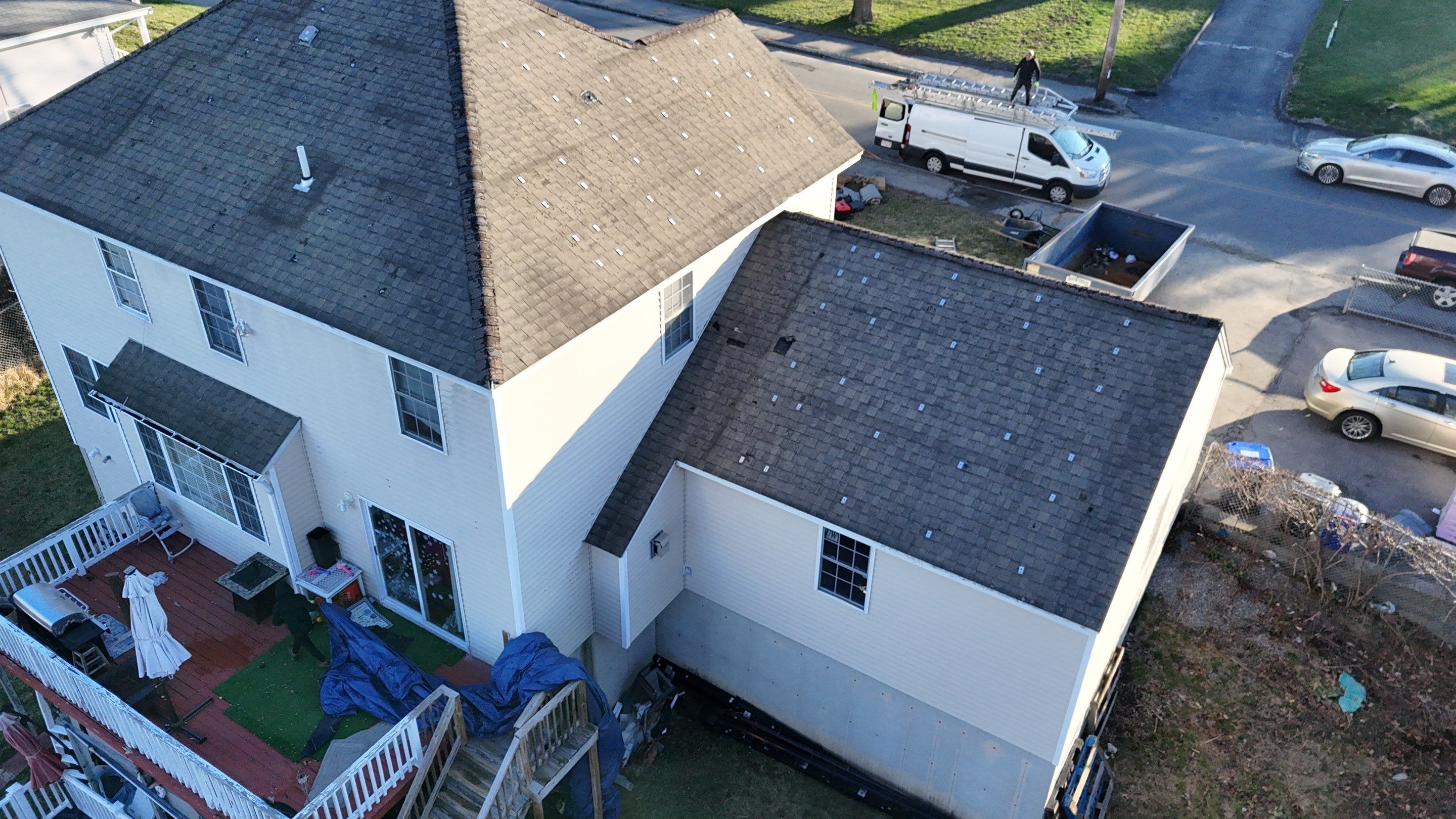 Full Roof Replacement + Seamless Gutters by Mighty Dog Roofing of Greater Middlesex County
