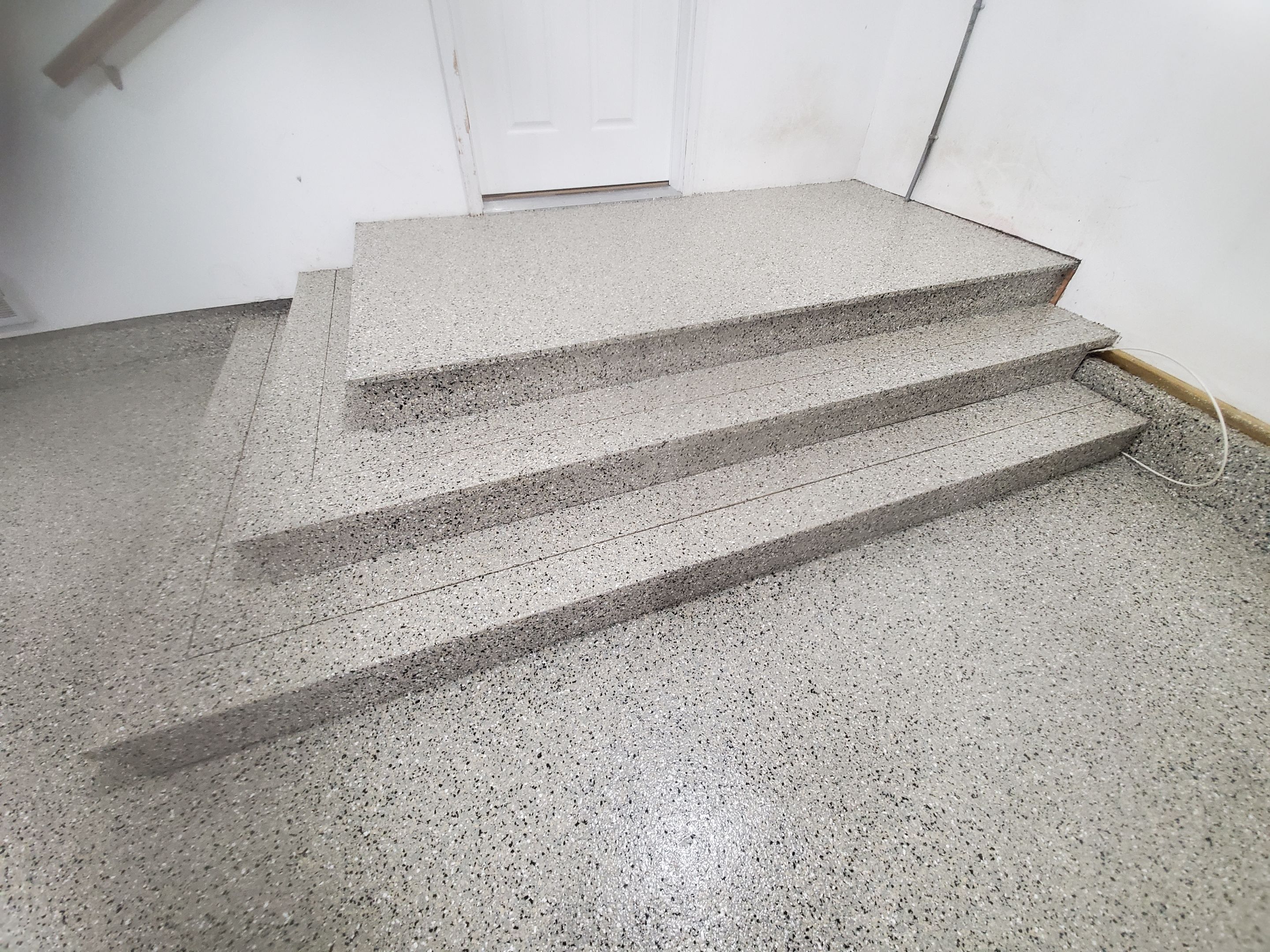 Garage using Mediterranean by Select Painting, Coatings & Garage Cabinets