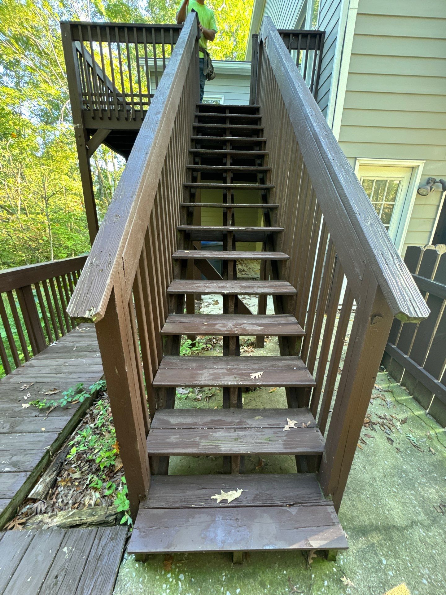 Elevated Deck Replacement with White Railings in Kennesaw by Swift Home Renovations 