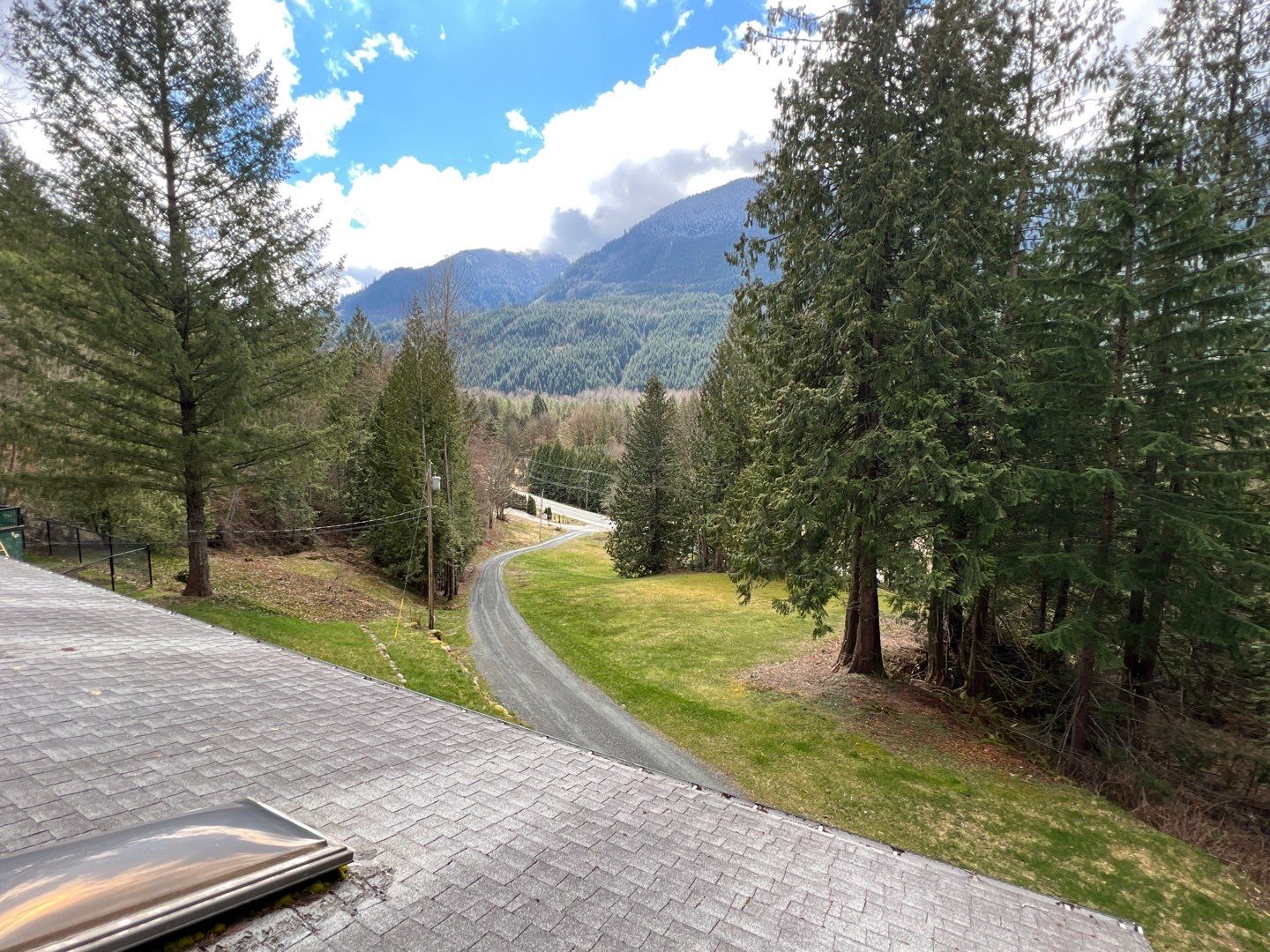 Residential ReRoofing Installation using 12" Prolok metal by Top Notch Roofing Inc