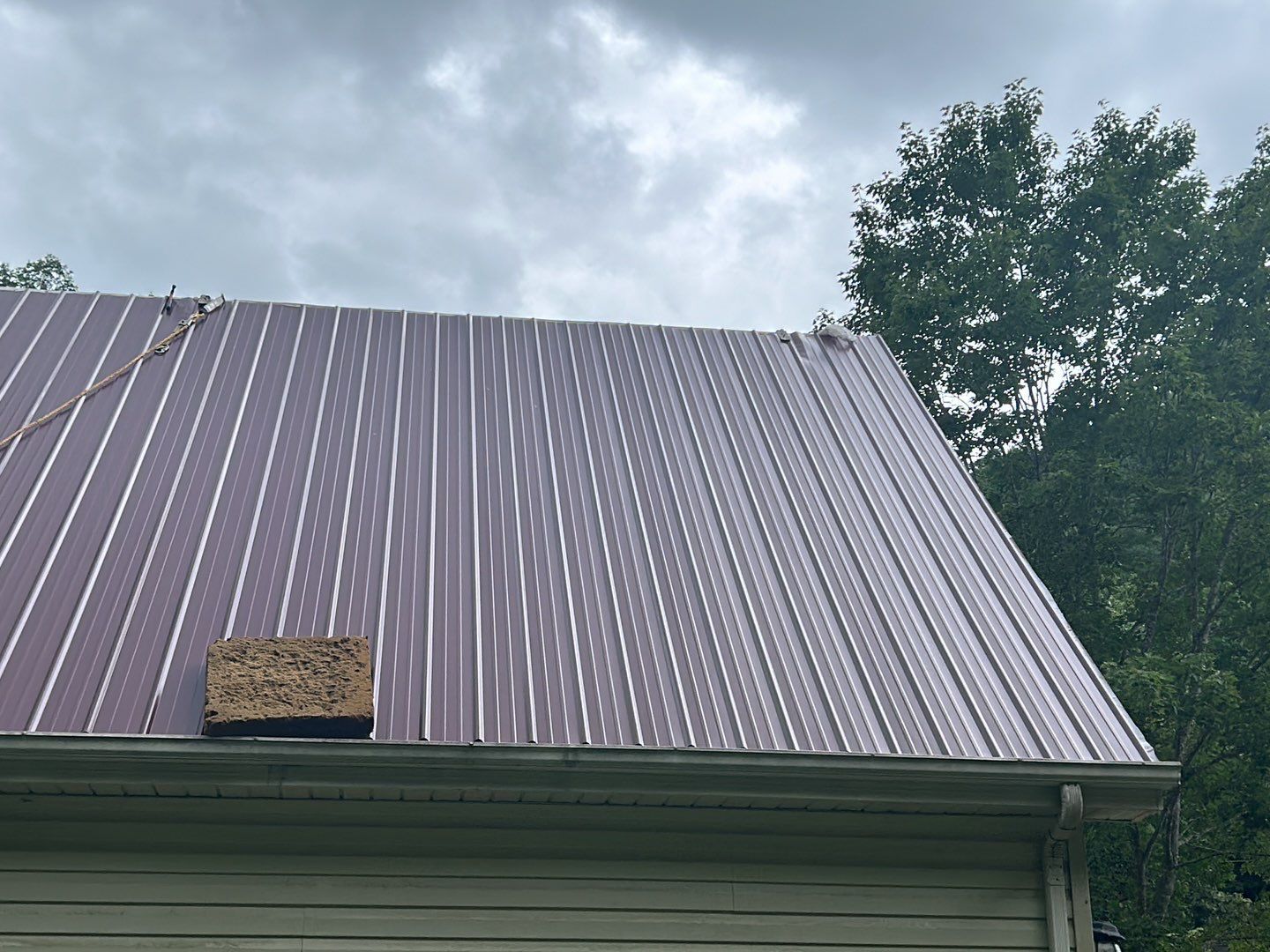 Residential Roofing Installation using Metal by Mr. Roofer