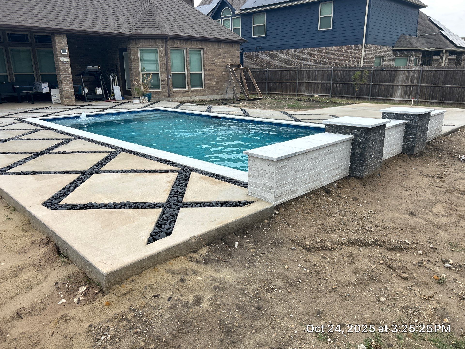 Modern Geometric Pool with Raised Wall and Paver Deck by Pinnacle Pools and Spas - DFW