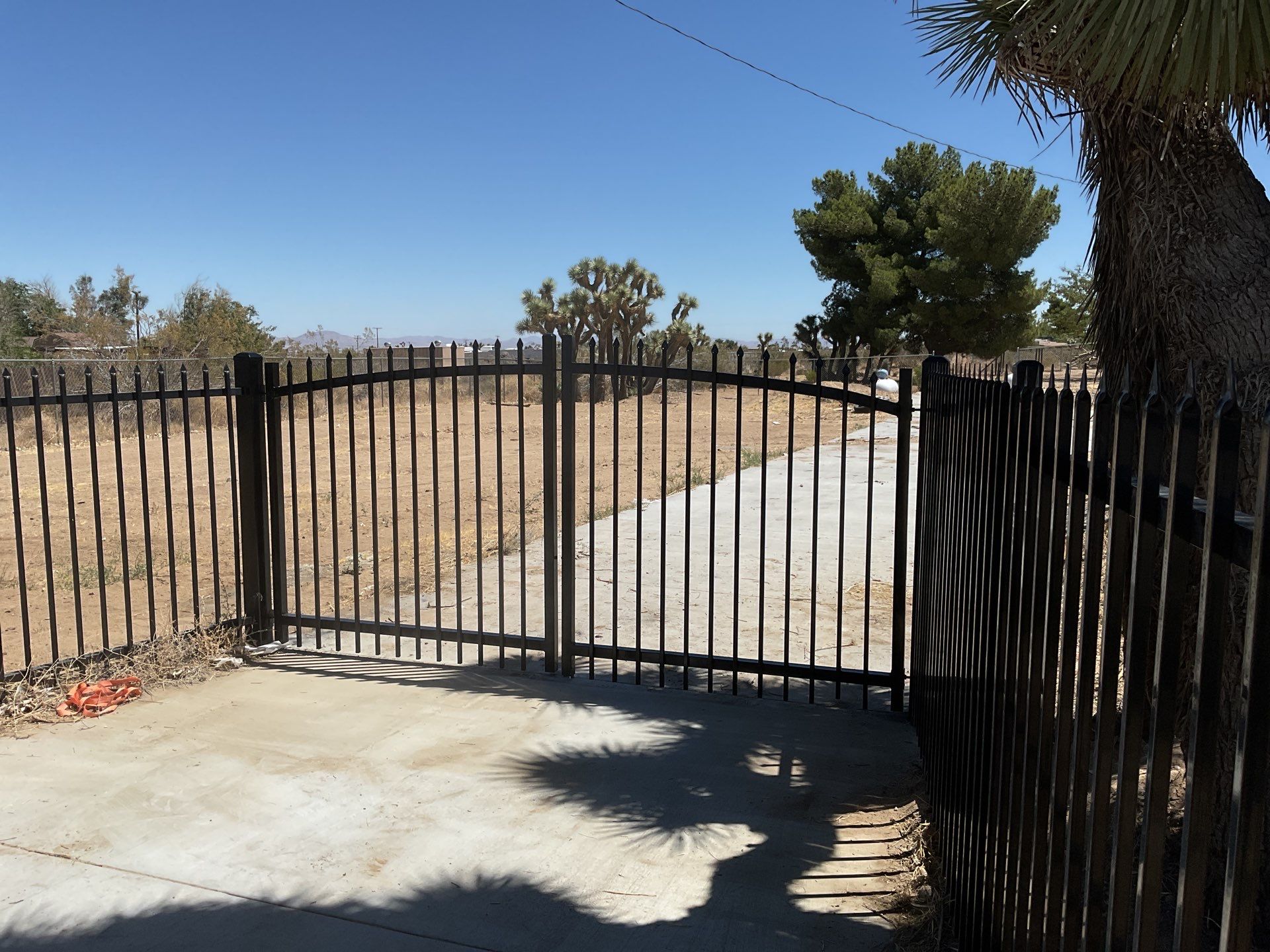 Gate installation using Wrought Iron by Fence Guys Inc. 