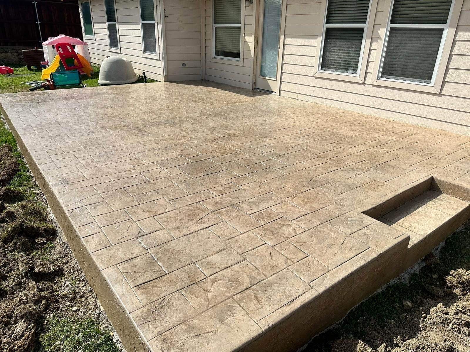 Concrete & Outdoor Living by Trophy Roofing & Construction LLC