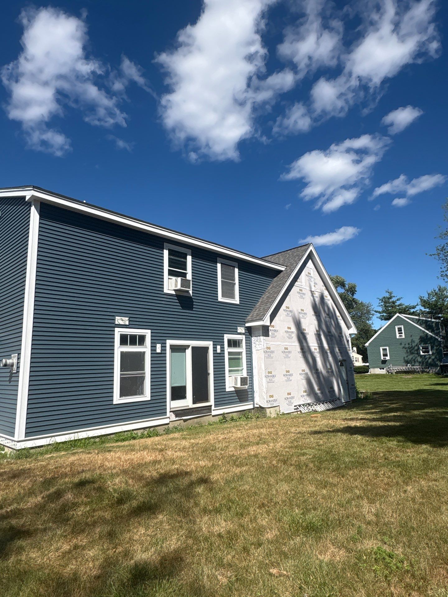 Premium Mixed-Material Siding Installation in North Billerica, MA by Mighty Dog Roofing of Greater Middlesex County