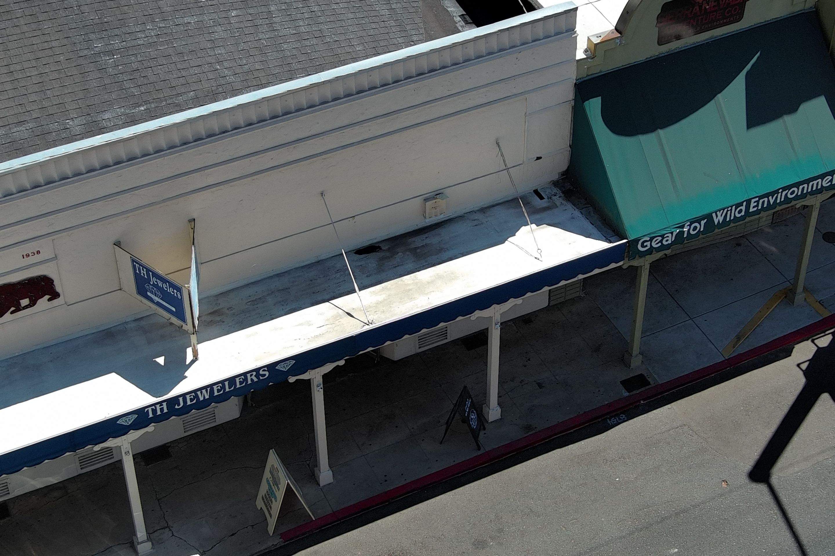 Foam and coatings on commercial roof by Straight Edge Roofing Inc