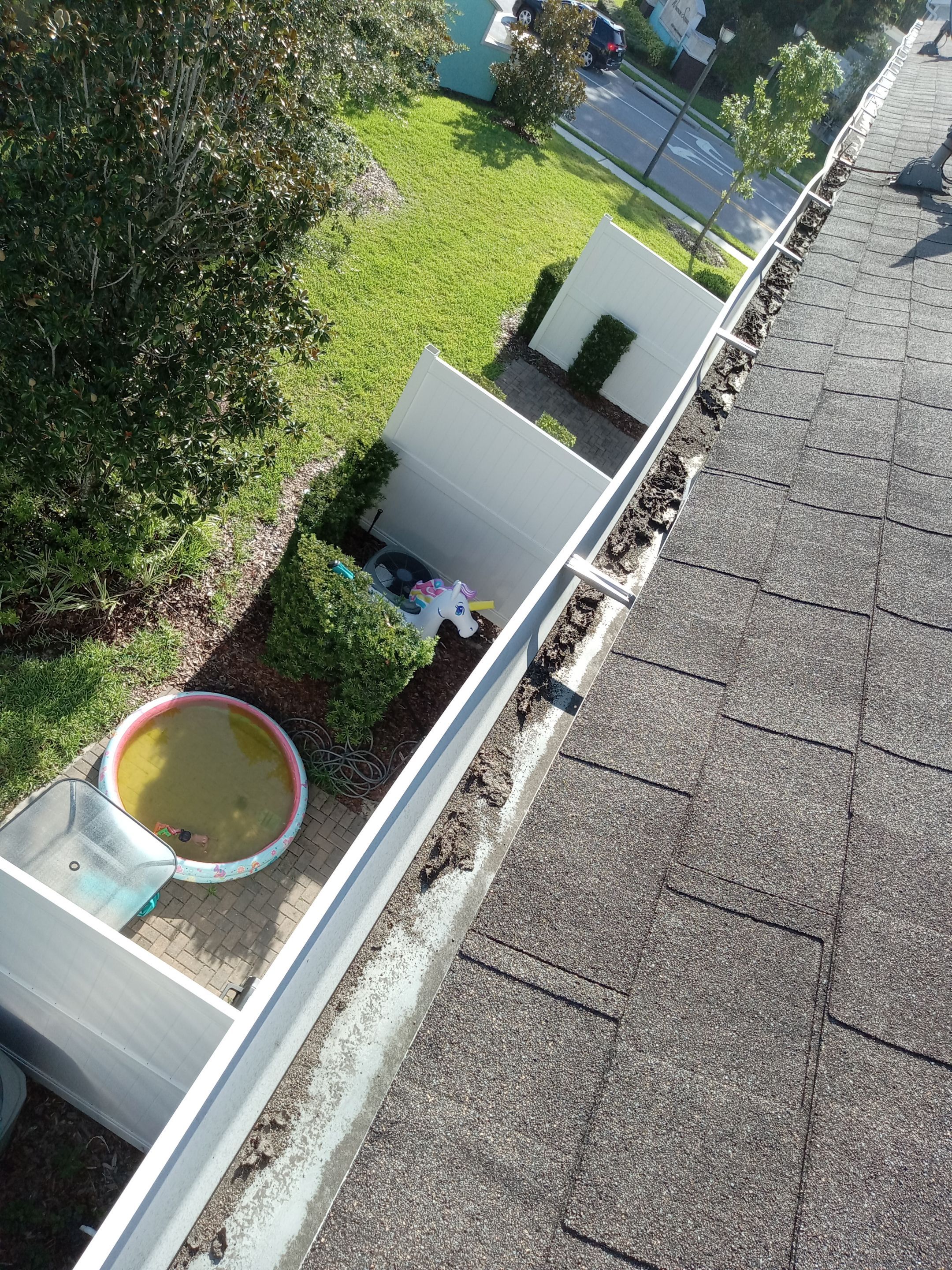 HOA gutter cleaning before photo.