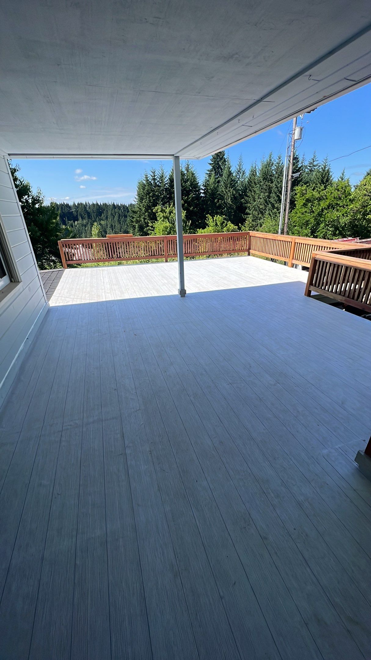 Residential Deck Replacement using Dec-Tec Membrane Color: Grafton by Orezona Building & Roofing Company, Inc.