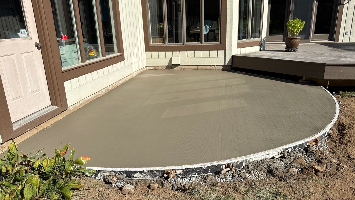 Broom finished concrete patio and walkways  by NG Masonry & Construction LLC