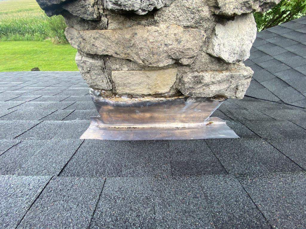 Storm damage roof replacement by Nitro Roofing and Construction