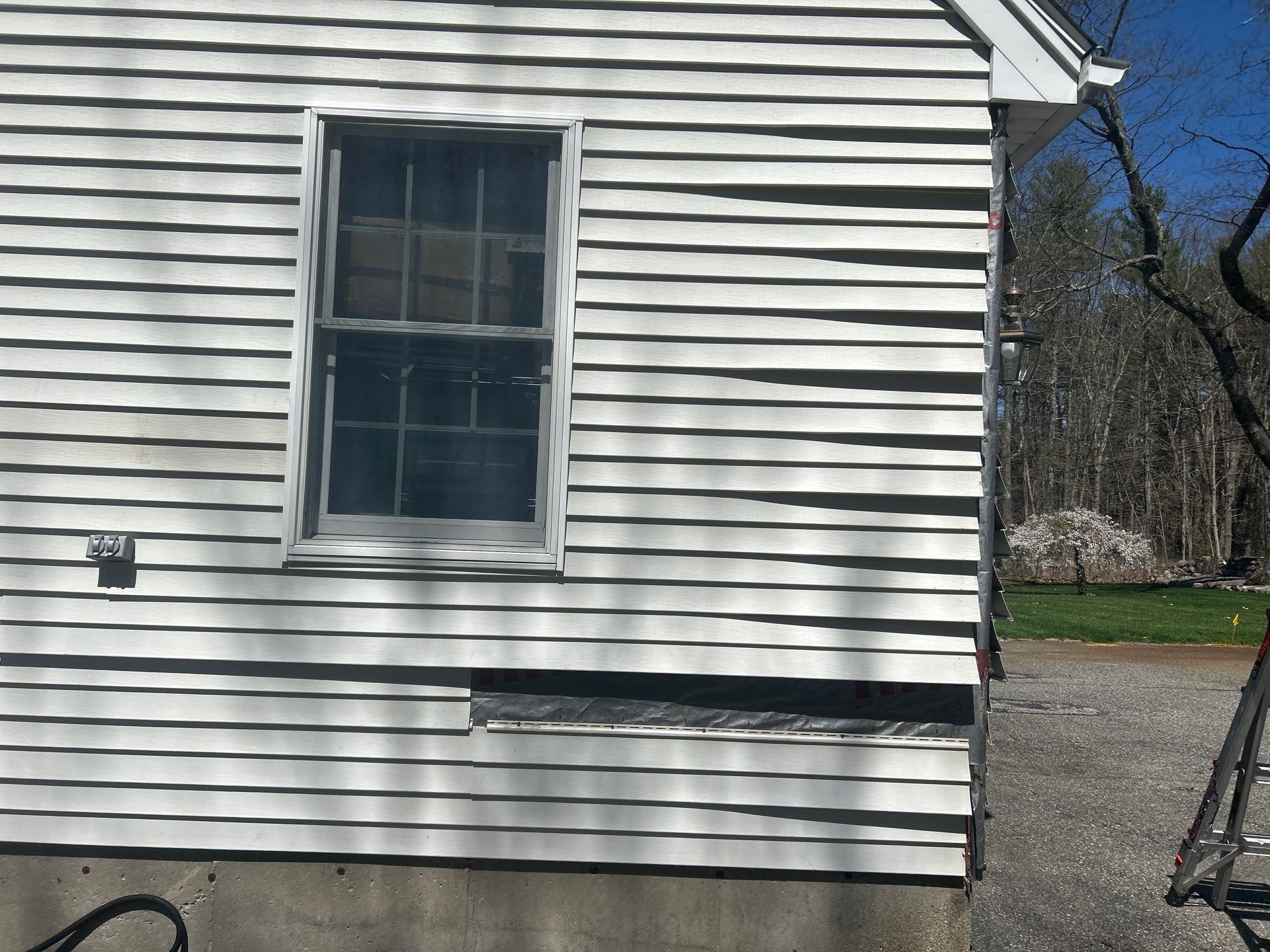 Vinyl Siding Repair with Spot Replacement by Mighty Dog Roofing of Greater Middlesex County