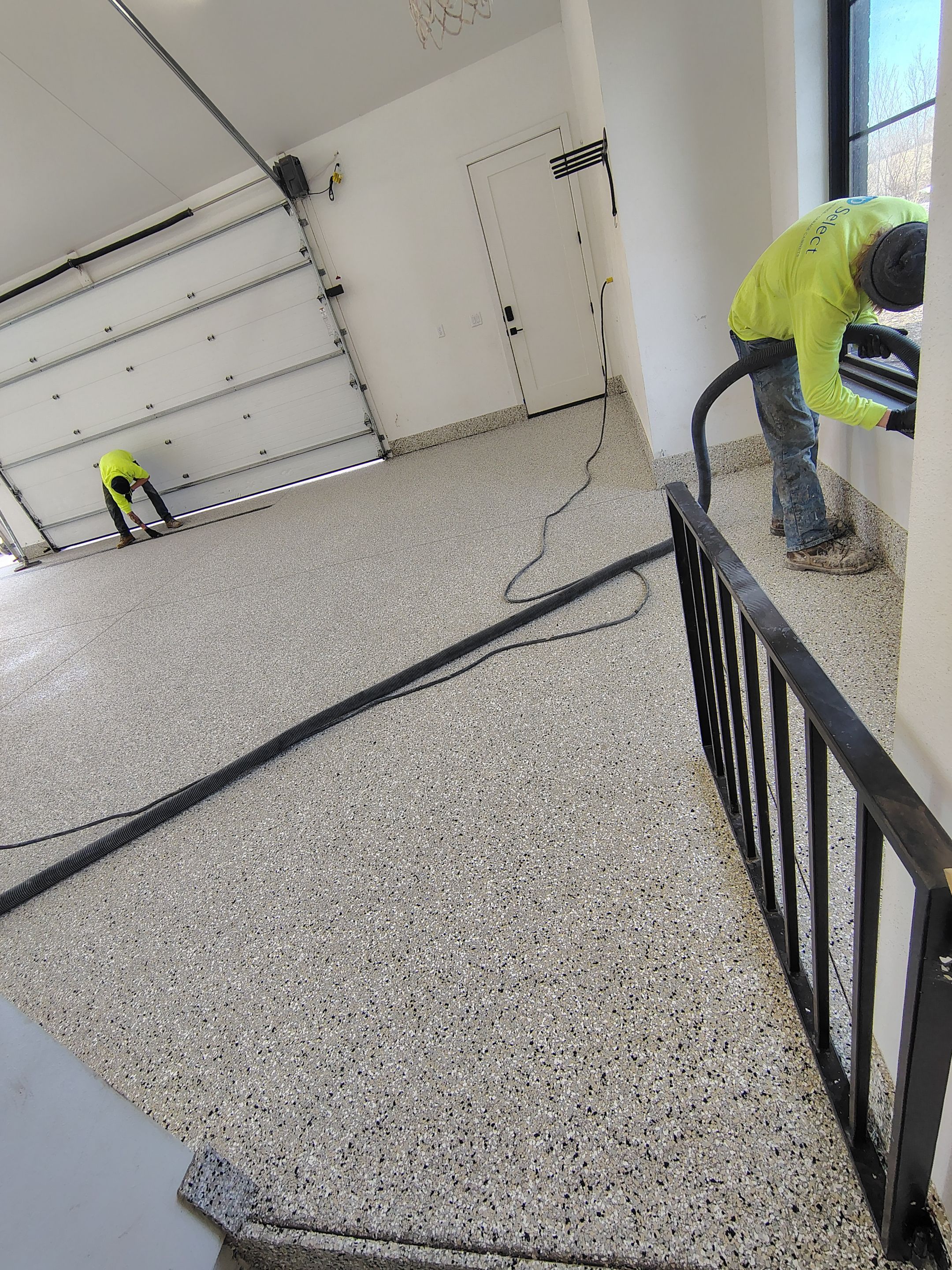 Epoxy Flake Garage Floor and Stair Coating in Sioux Falls by Select Painting, Coatings & Garage Cabinets