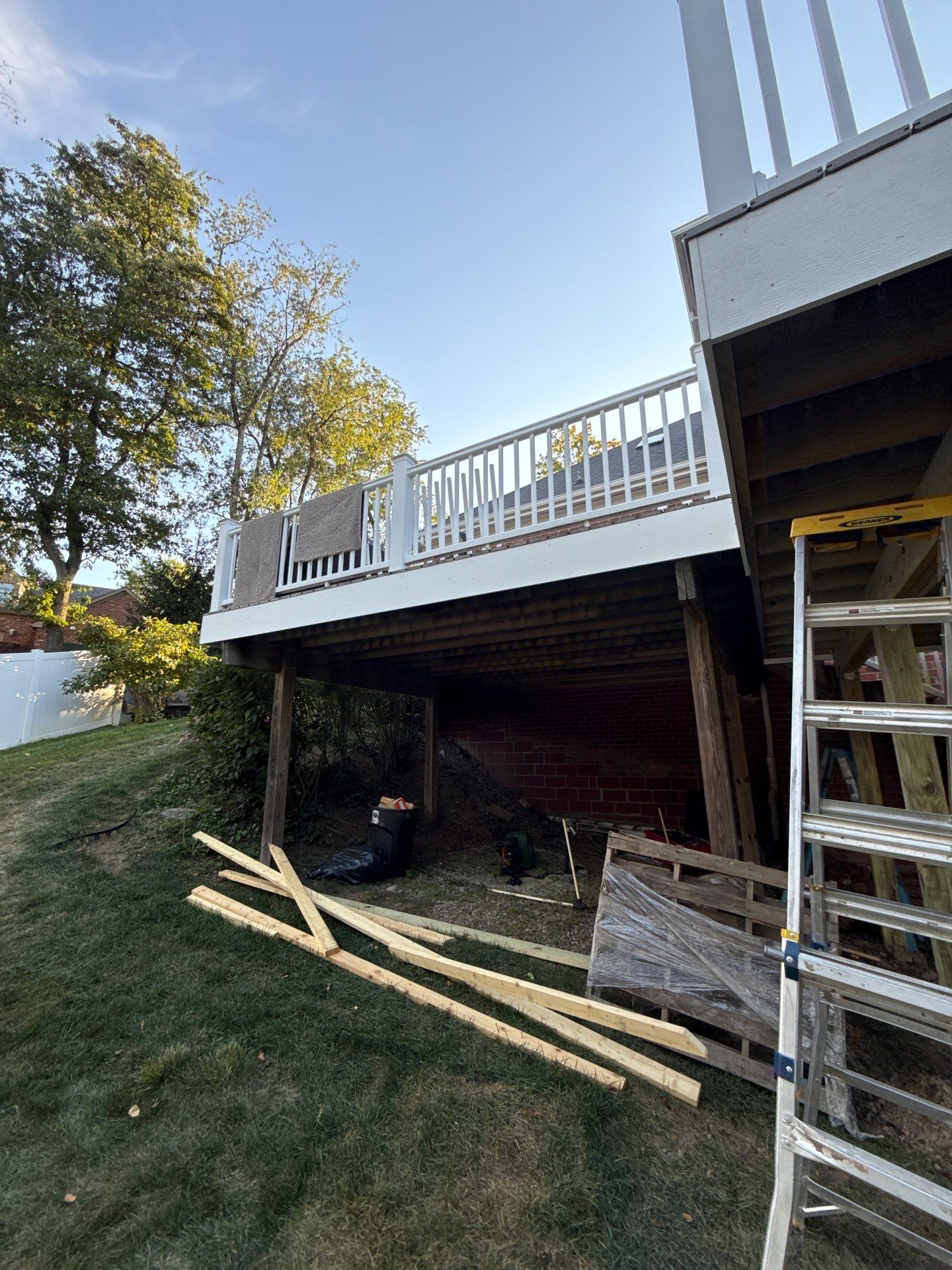 Deck extension  by Cousins Roofing Siding & Decks
