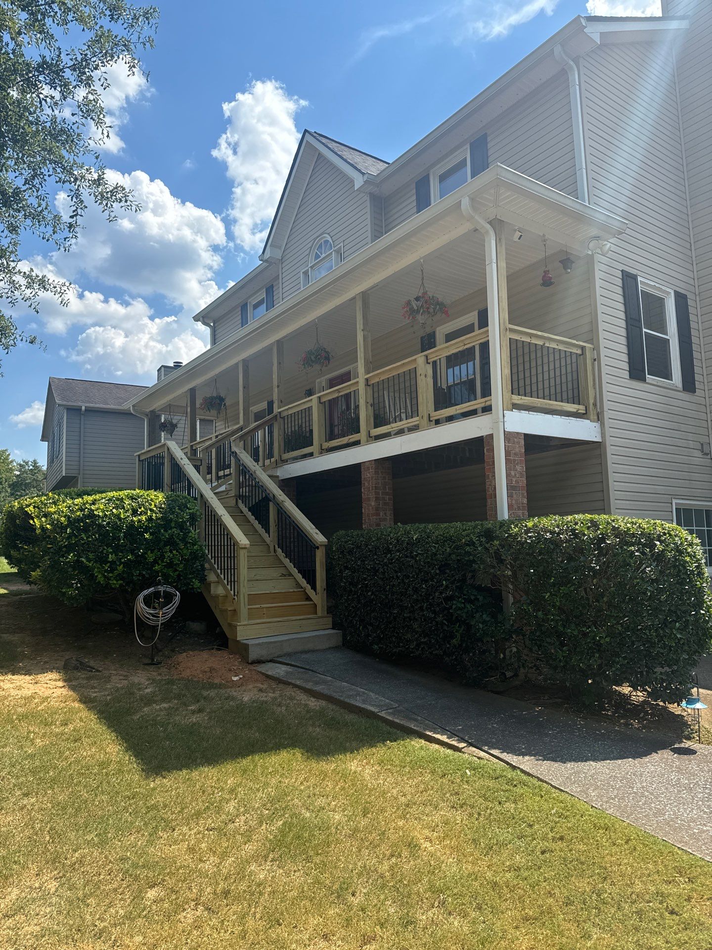 Elevated Deck Construction and Front Porch Renovation in Powder Springs by Swift Home Renovations