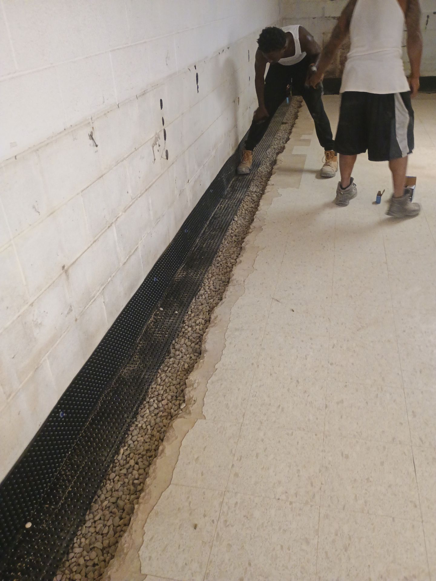 Interior Drain Tile Installation in Columbia Heights, MN by Waterproofing Northeast