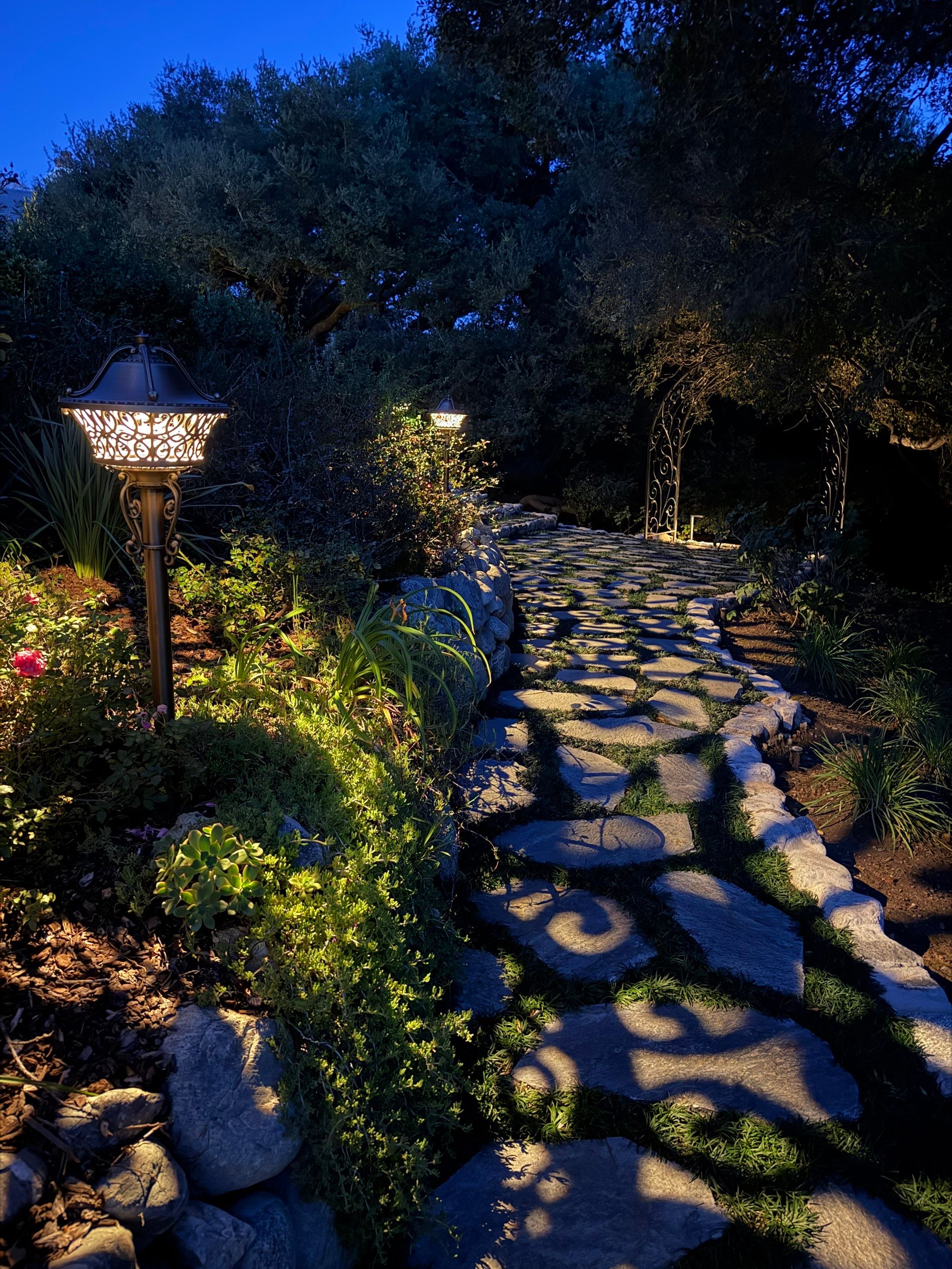 Tudor Estate Landscape Lighting with Integrated Stone Step Illumination by Outdoor Lights + Shades