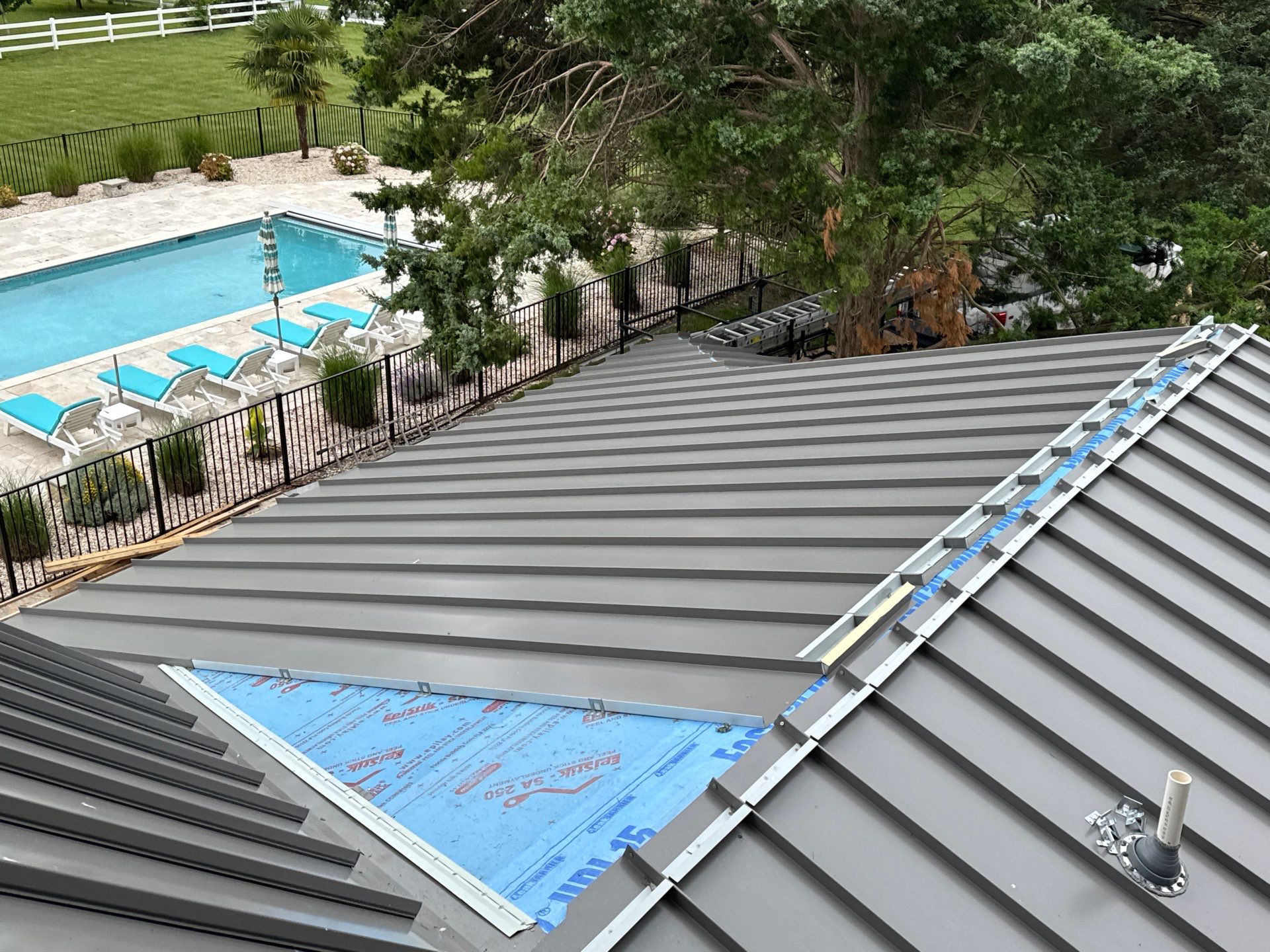 Custom New Construction Metal Roof Installation in Deltaville by Cade Construction