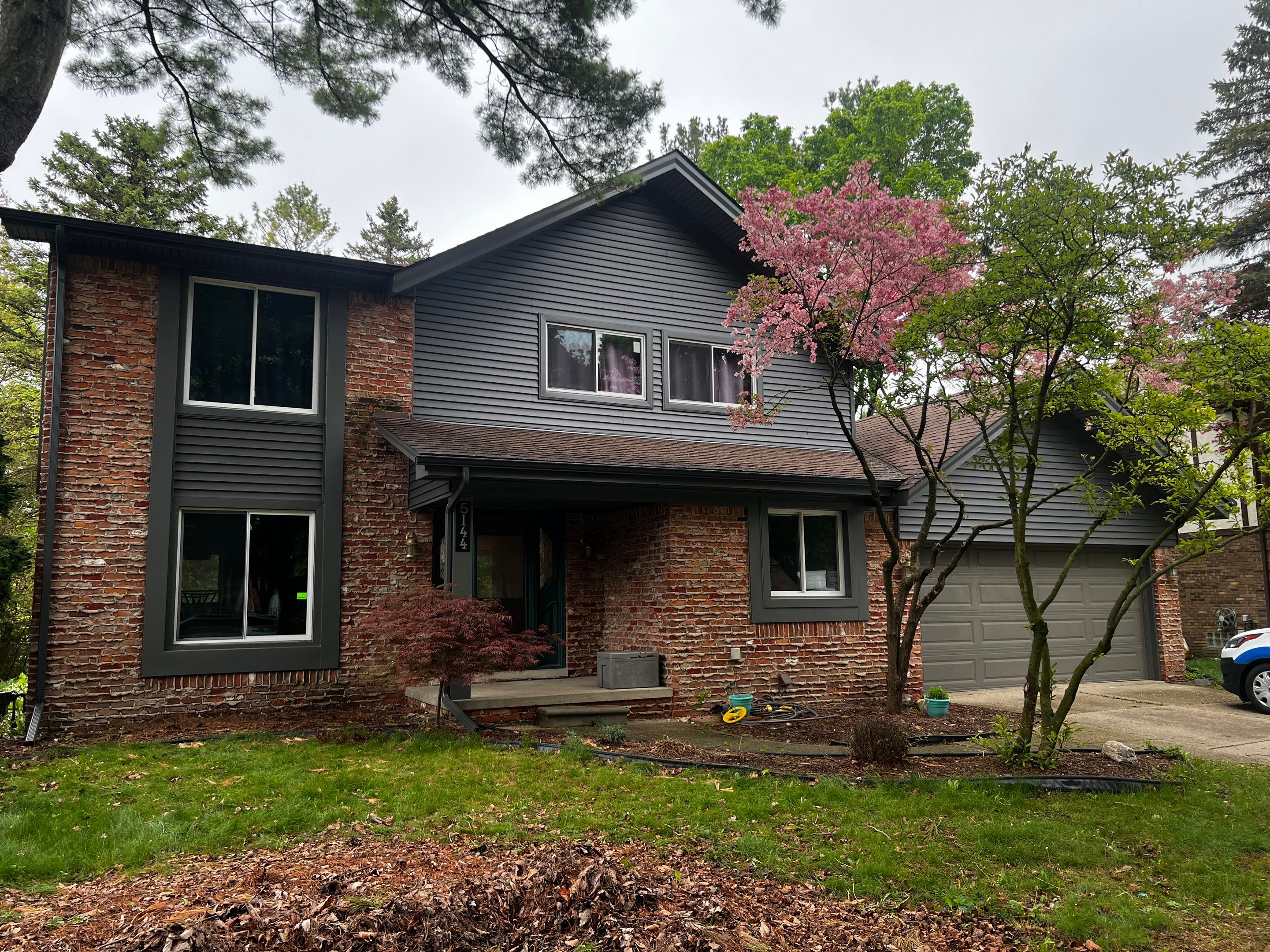 Siding Replacement  using Certainteed Monogram Vinyl D4" Smoky Gray color by Bloomfield Construction & Restoration