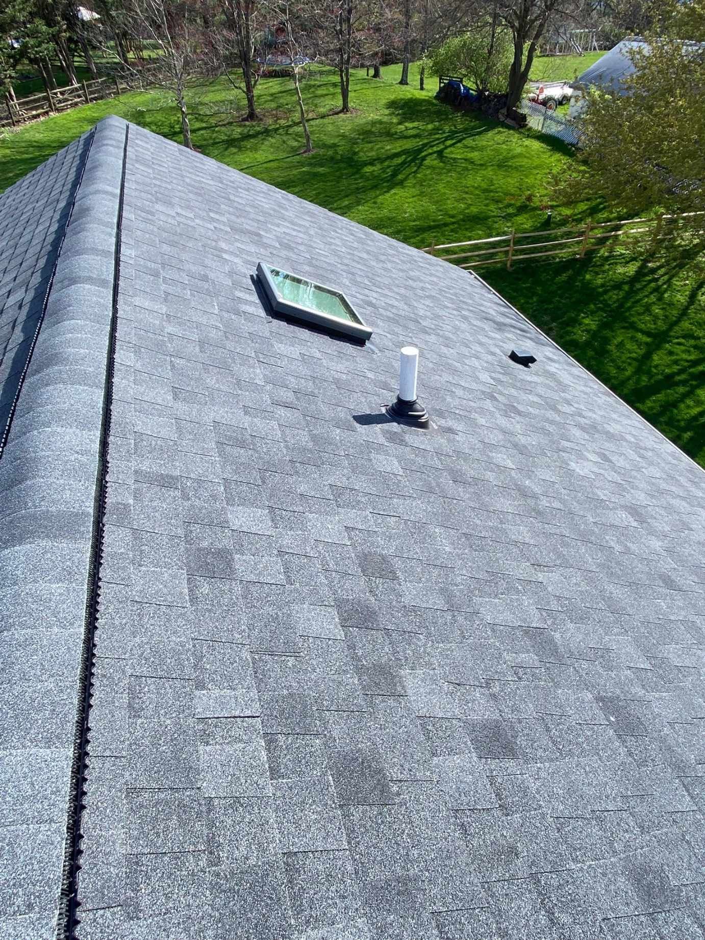 Residential Roofing Installation using Atlas Pinnacle Pristine Black Architectural Shingles by Frederick Roof Repair