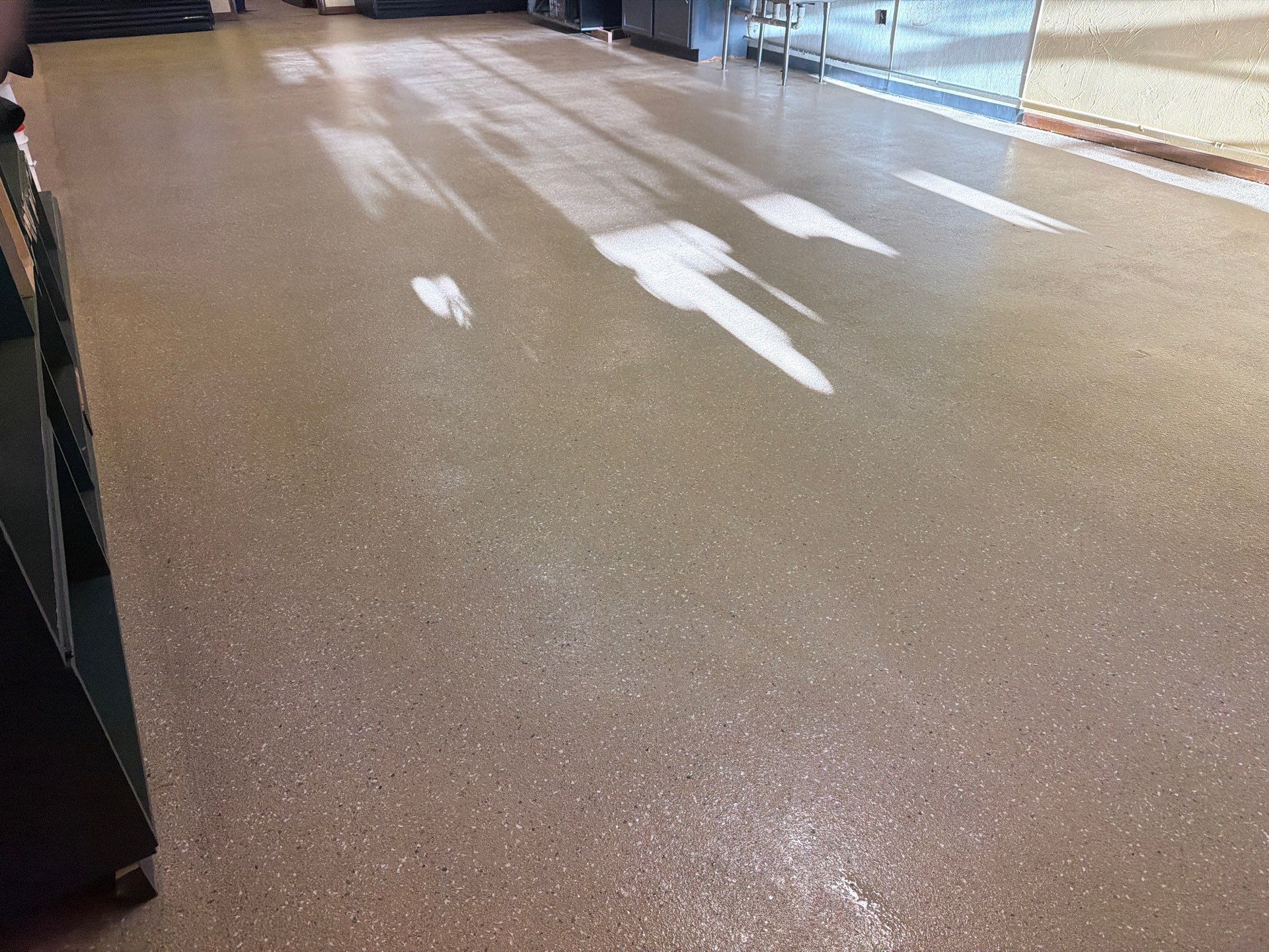 Epoxy Flooring Installation – Downtown Muskegon Commercial Space by Gordon Painting