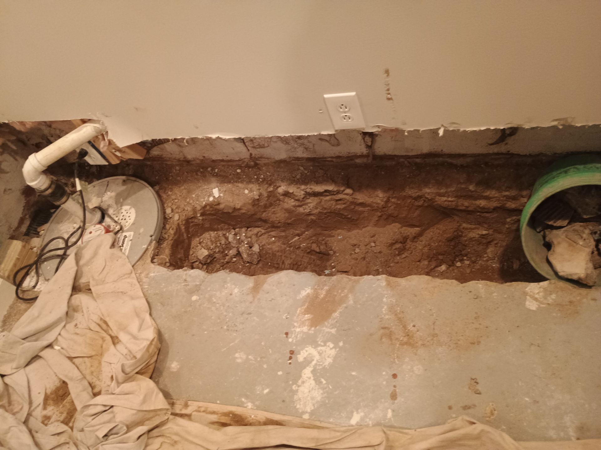 Interior Drain Tile in a Finished South Minneapolis Basement by Waterproofing Northeast
