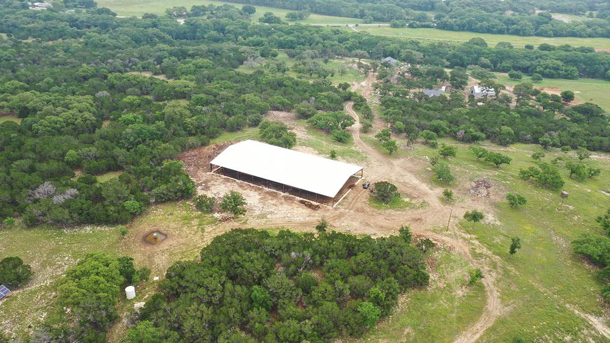 150K Equestrian center with 25K backup tank for potable water. by Hill Country Rain Water