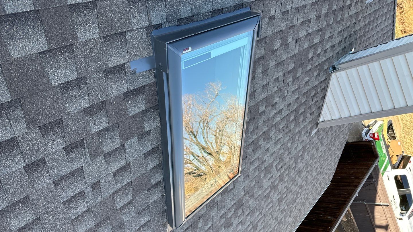 roof, skylight, and vent replacement in Edmond by McCann's Roofing and Construction