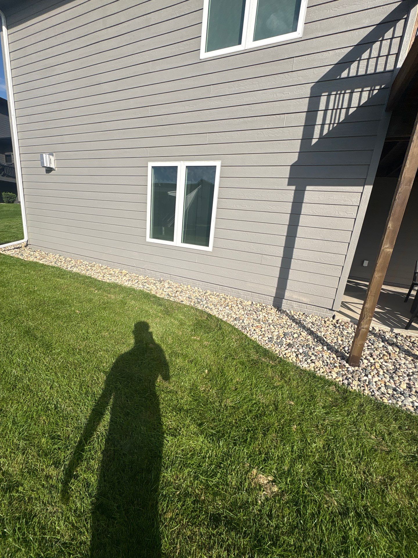 Gray Foundation Painting and Exterior Surface Refresh in Sioux Falls by Select Painting, Coatings & Garage Cabinets