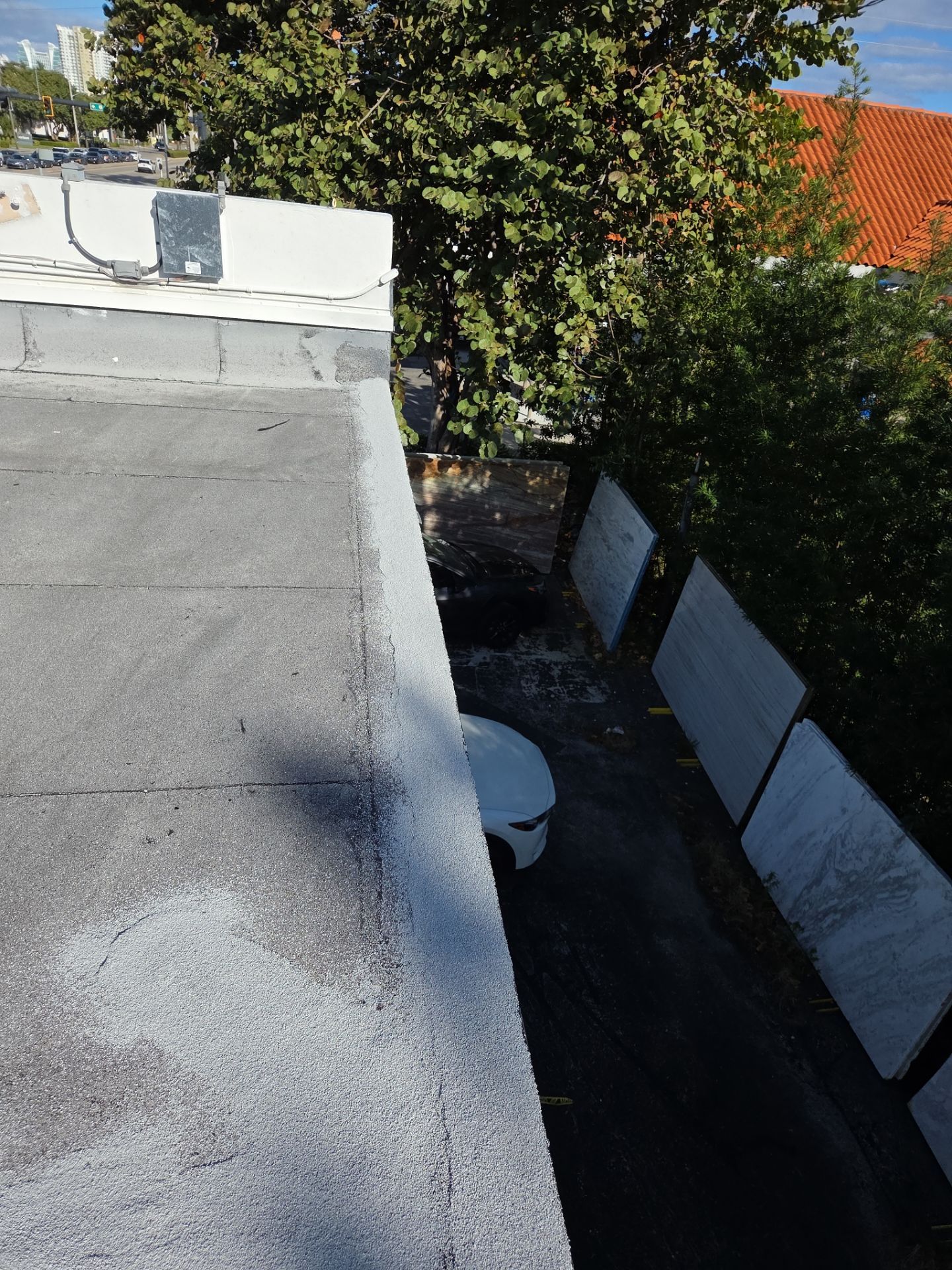 Commercial Flat Roof Restoration Using Silicone Coating in Hallandale Beach by Aastro Roofing