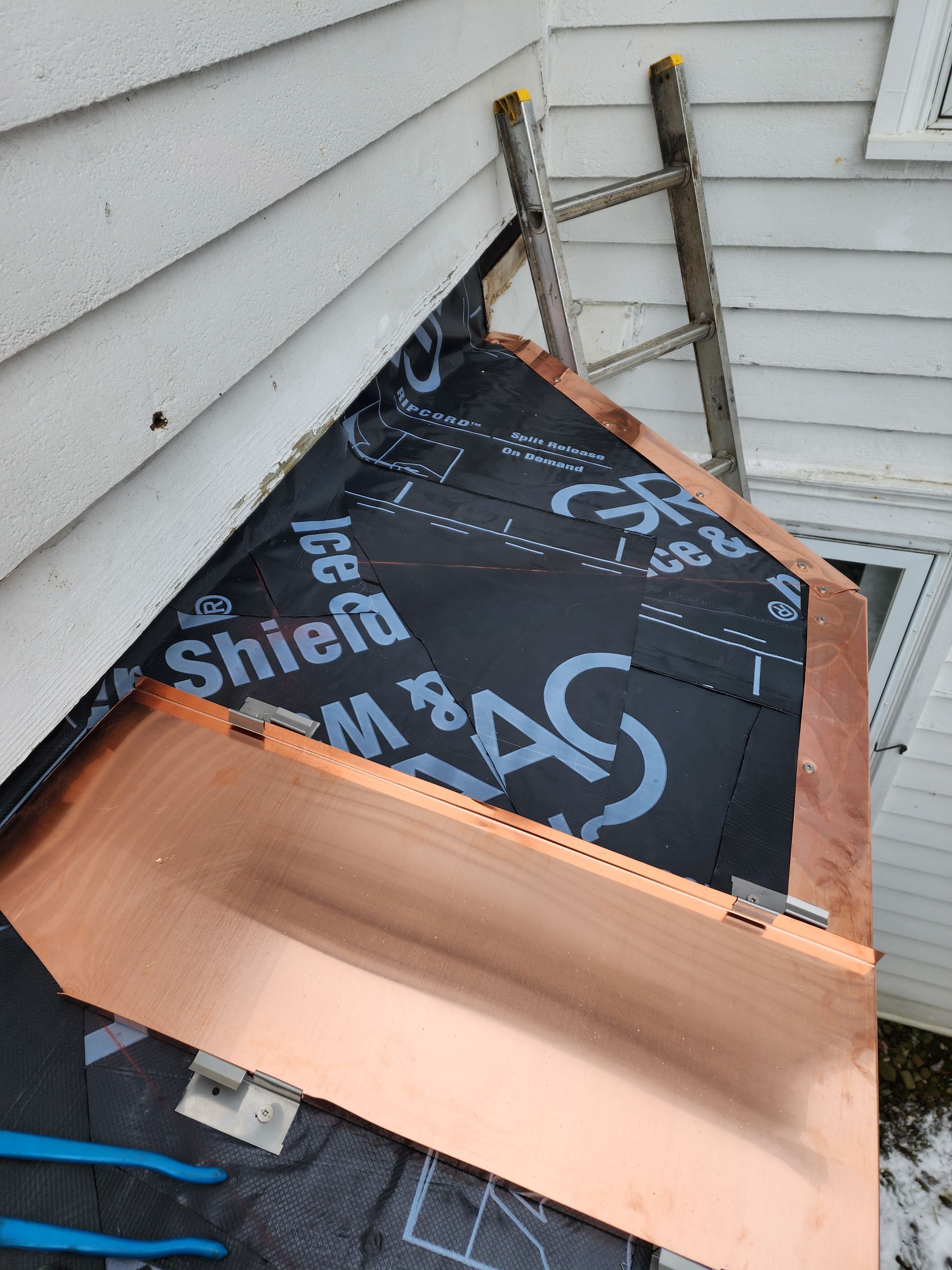 Copper Roof using Copper by Absolute Roofing and Construction