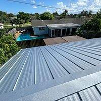 .032 Aluminum 1.5" Mechanical Seam Matte Black  by Total Roofing System The Metal Roof Experts