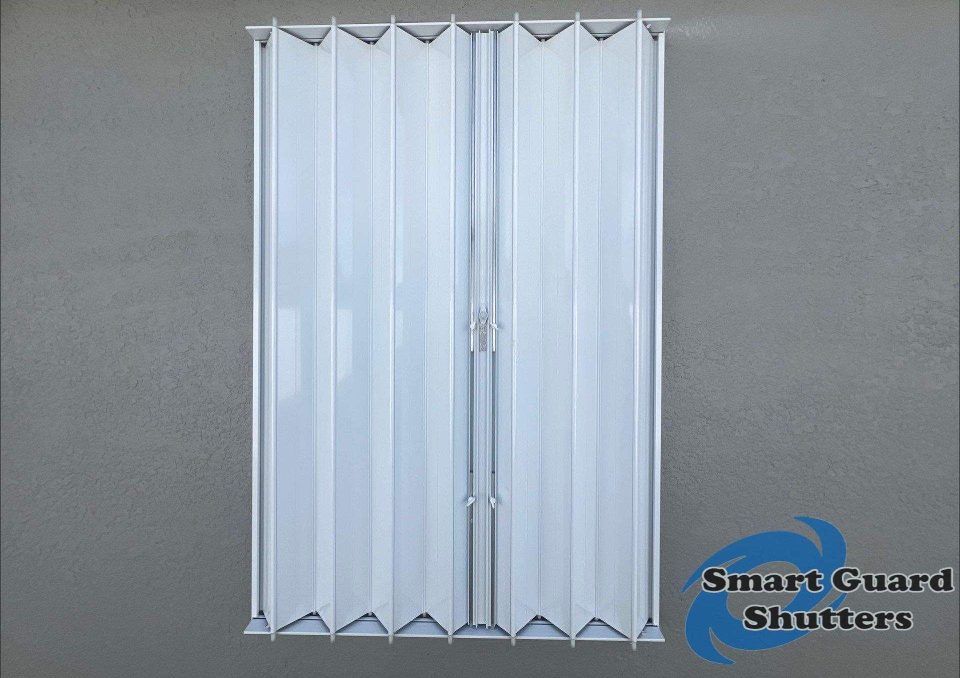 Accordion Shutters in White by Smart Guard Shutters