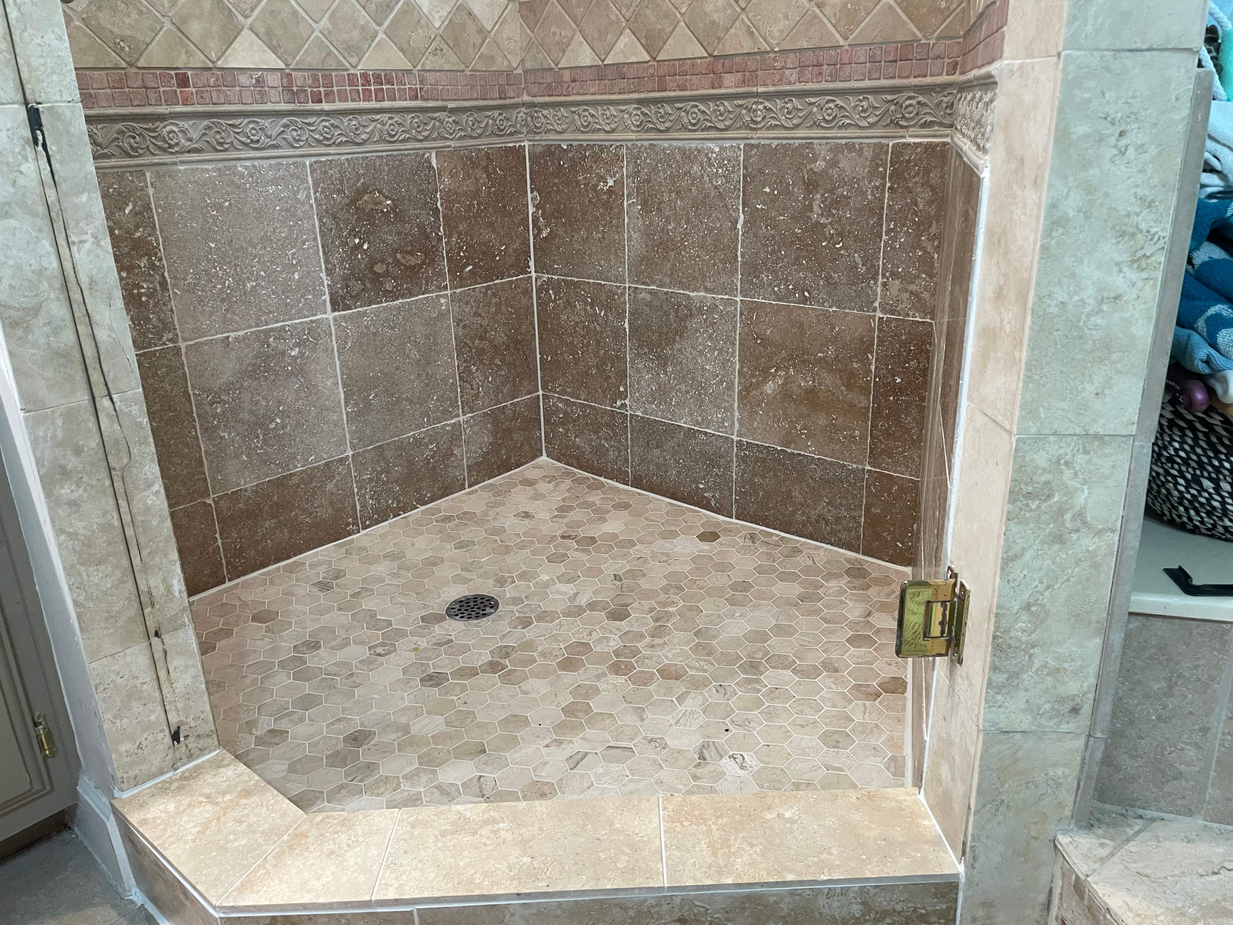 Shower floor repair by Prudencio
