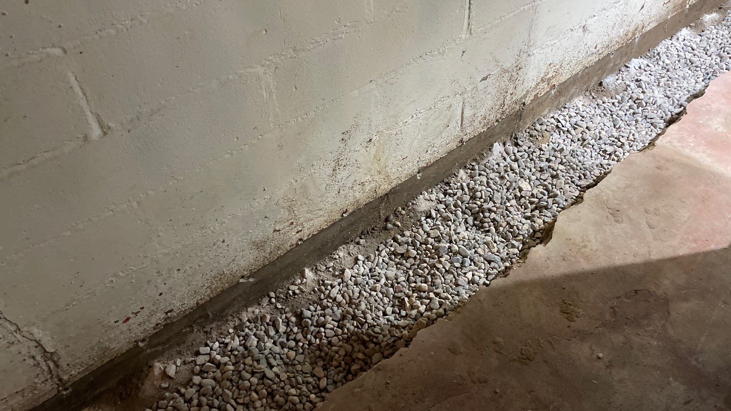 Interior Drain Tile & Sump Pump System in North Minneapolis by Waterproofing Northeast