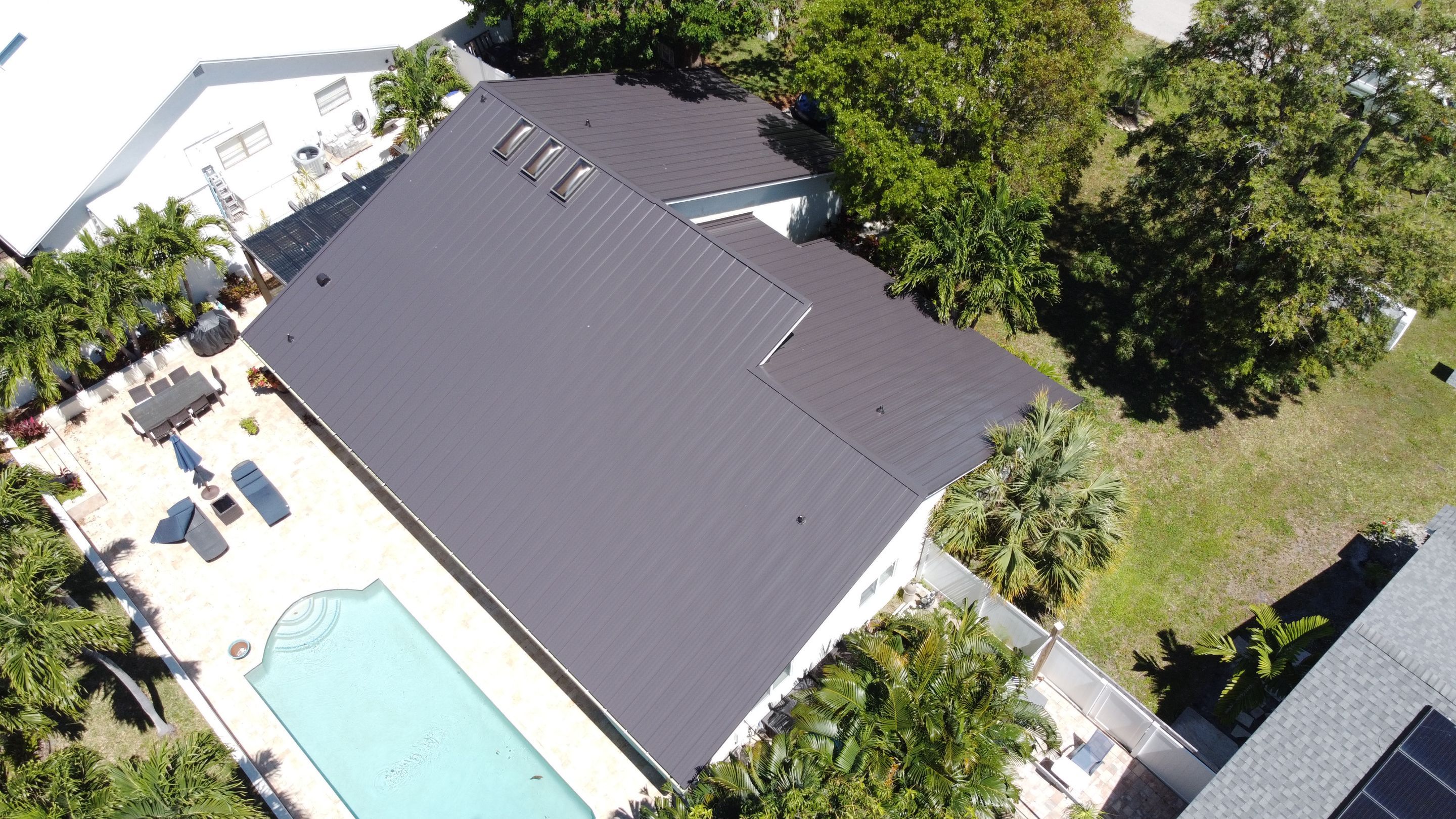 Residential Roofing Installation using 1" Nail strip metal roof by BLUES BROTHERS CONSTRUCTION CORP